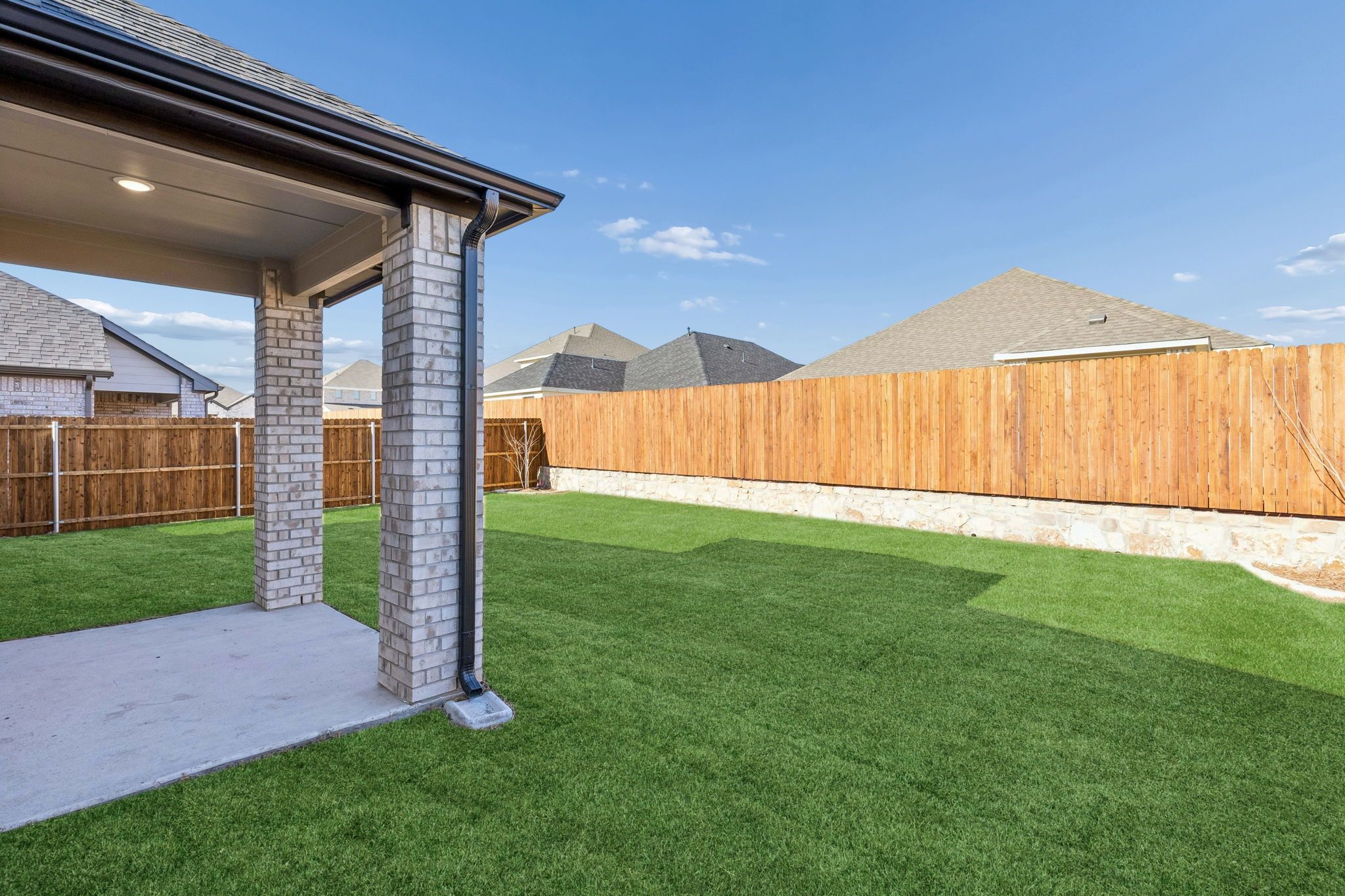 Covered Patio in the Haylee home plan by Trophy Signature Homes - REPRESENTATIVE PHOTO