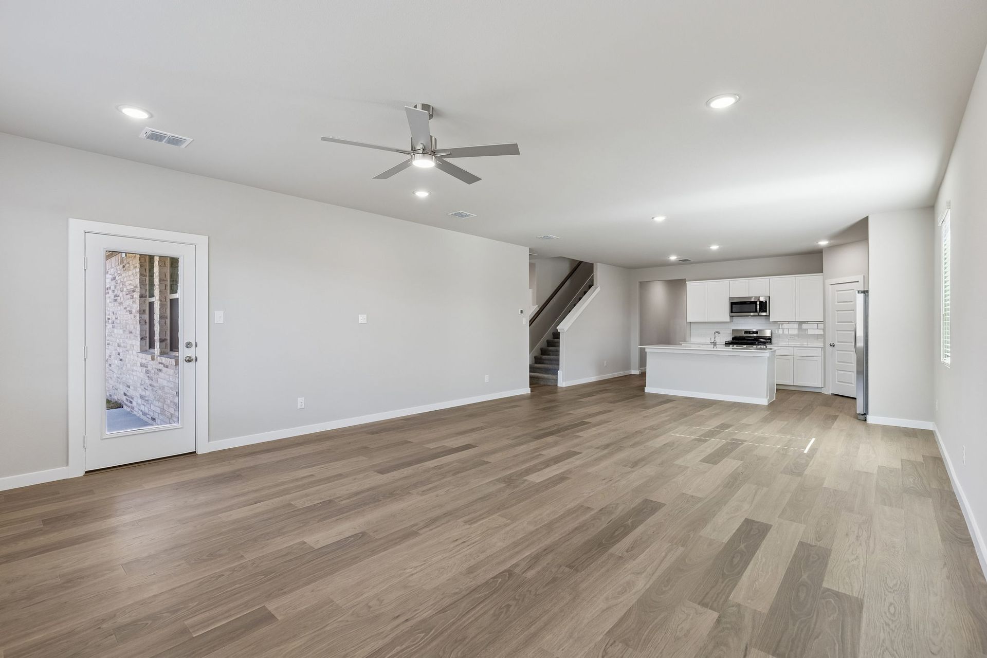 Open First Floor in the Holden home plan by Trophy Signature Homes – REPRESENTATIVE PHOTO