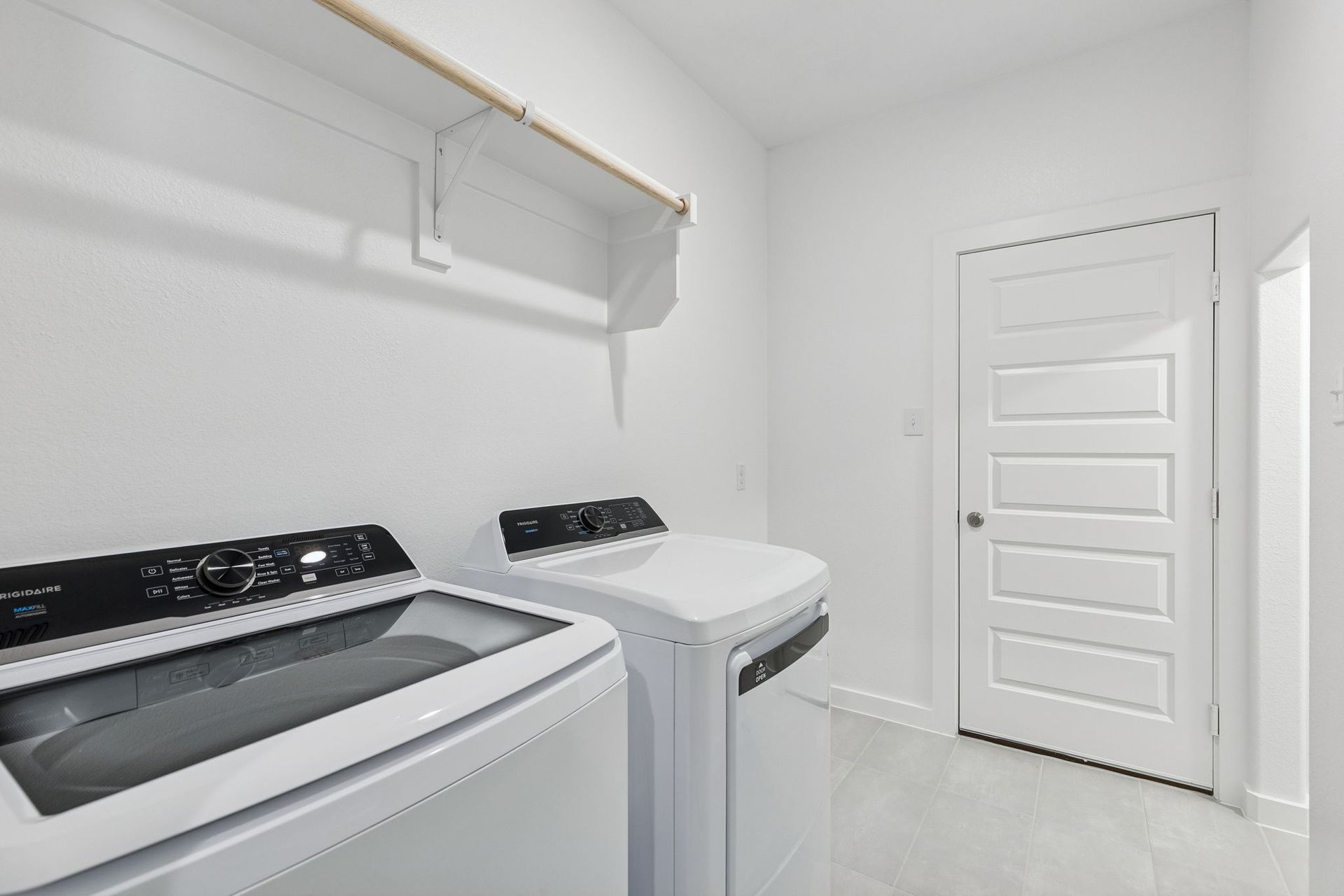 Utility Room in the Holden home plan by Trophy Signature Homes – REPRESENTATIVE PHOTO