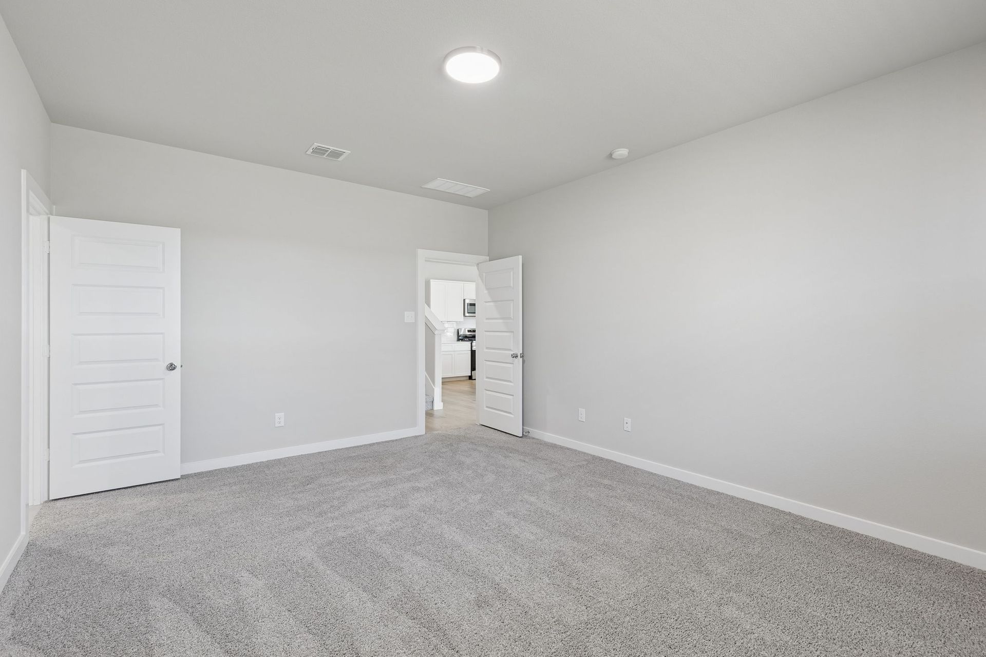 Primary Suite in the Holden home plan by Trophy Signature Homes – REPRESENTATIVE PHOTO