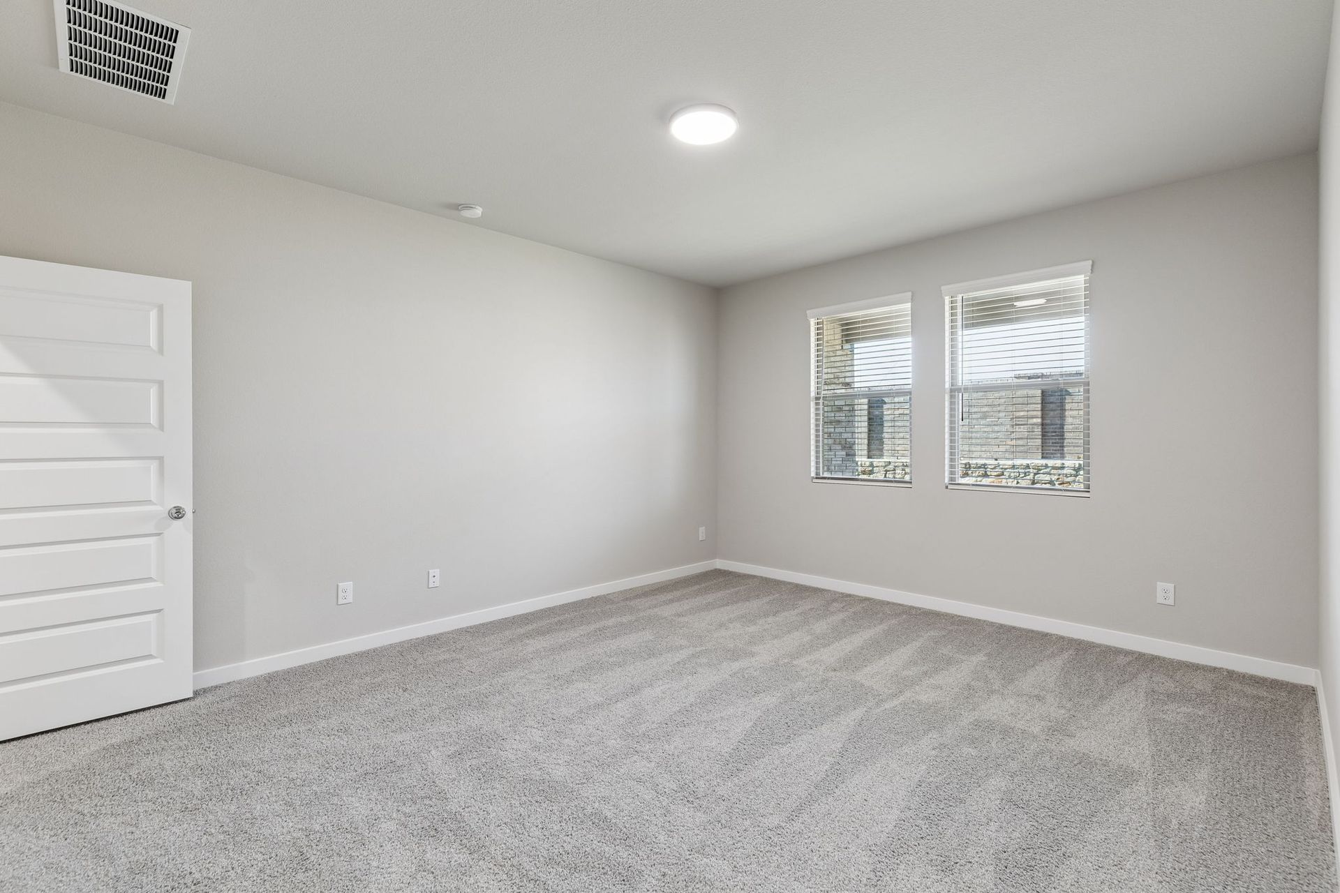 Primary Suite in the Holden home plan by Trophy Signature Homes – REPRESENTATIVE PHOTO