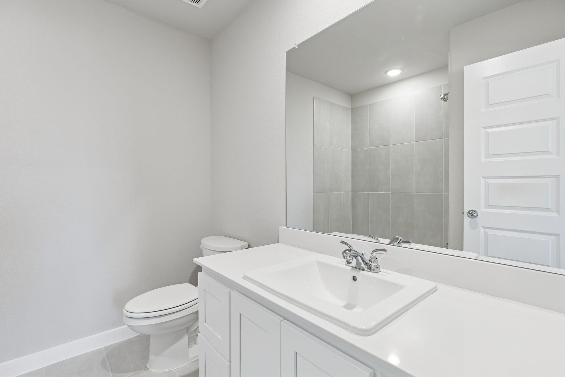 Bathroom in the Holden home plan by Trophy Signature Homes – REPRESENTATIVE PHOTO