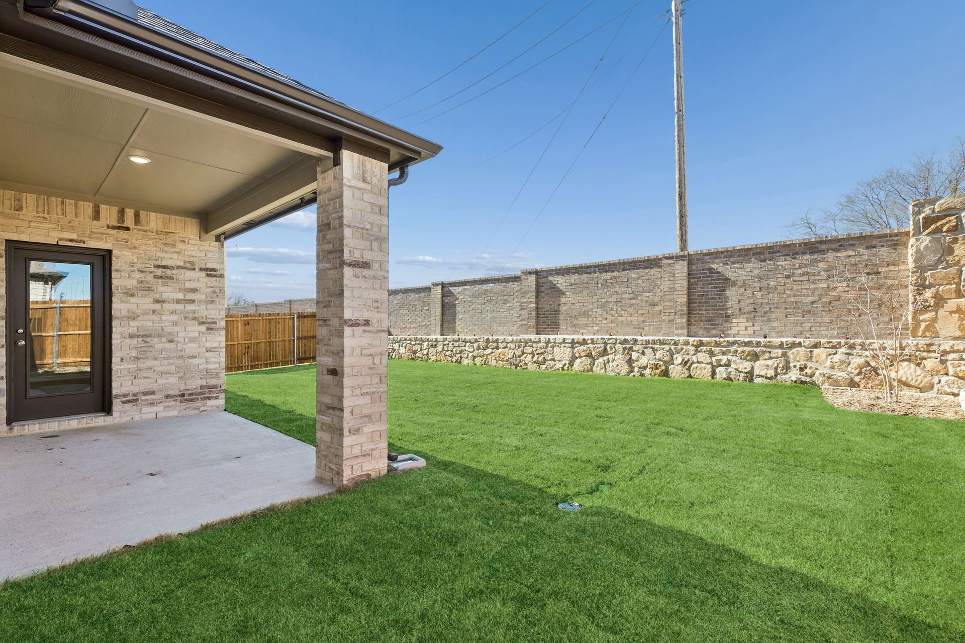 Patio in the Holden home plan by Trophy Signature Homes – REPRESENTATIVE PHOTO