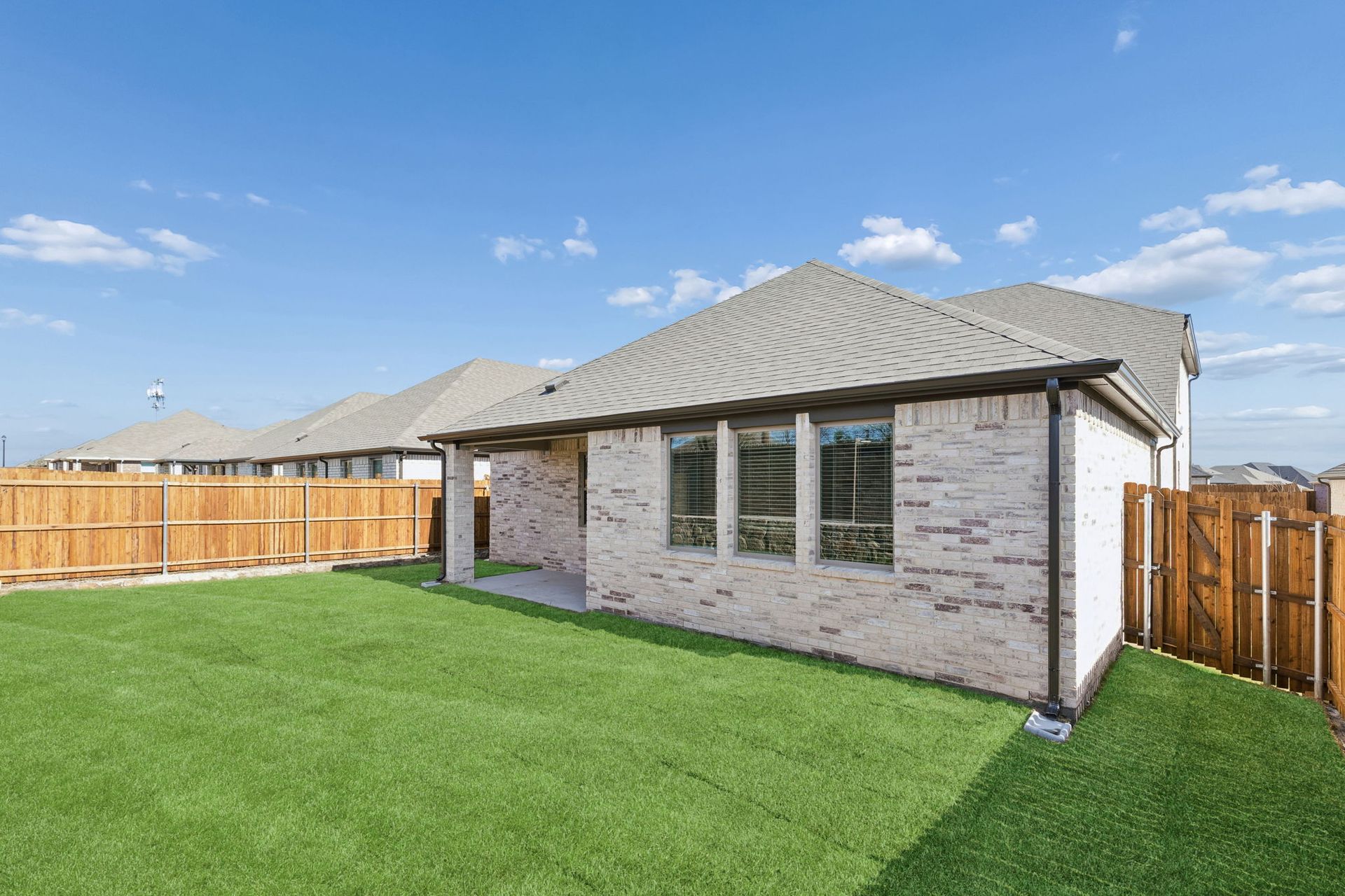 Patio in the Holden home plan by Trophy Signature Homes – REPRESENTATIVE PHOTO