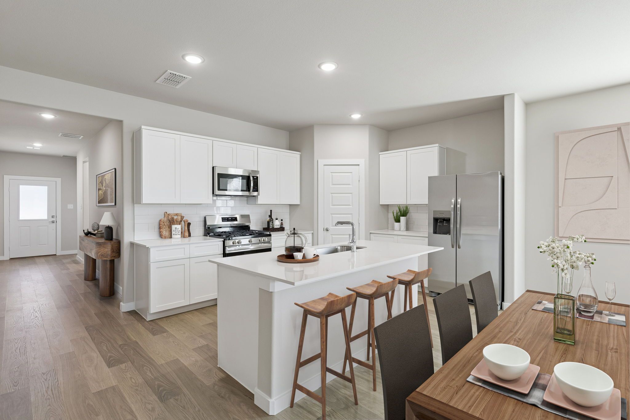 Kitchen in the Holden home plan by Trophy Signature Homes – REPRESENTATIVE PHOTO