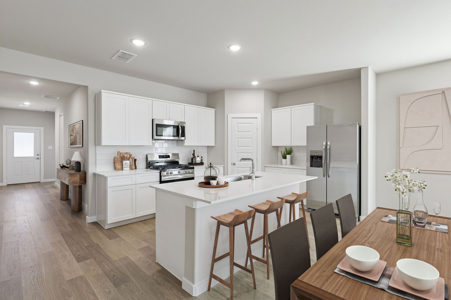Kitchen in the Holden home plan by Trophy Signature Homes – REPRESENTATIVE PHOTO