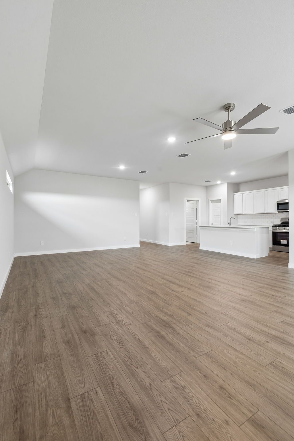 Open Floor Plan in the Oscar home plan by Trophy Signature Homes – REPRESENTATIVE PHOTO