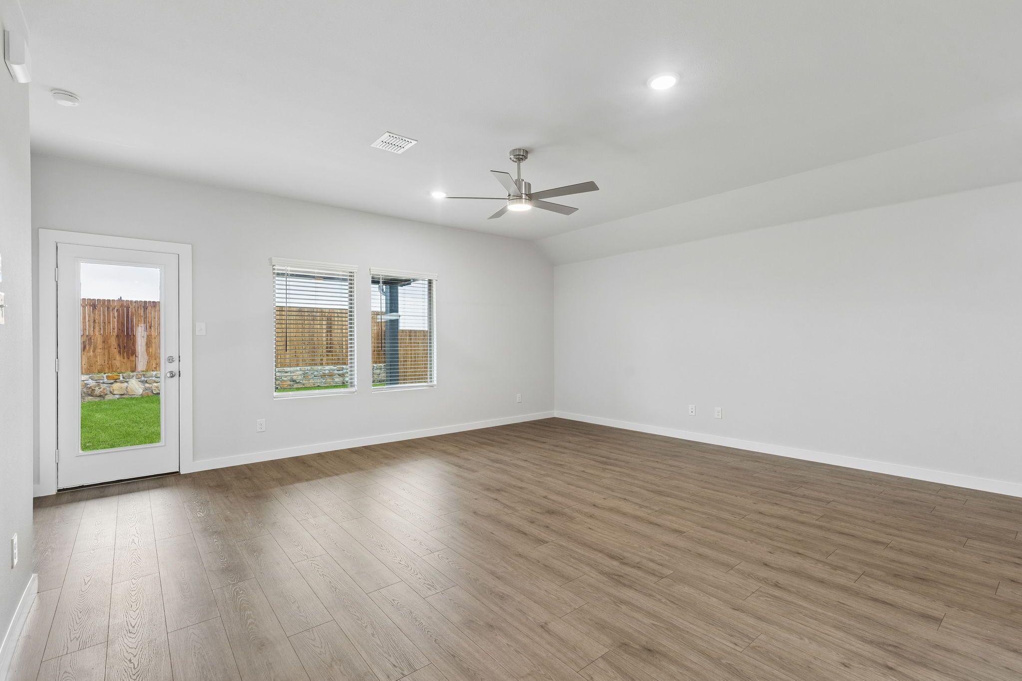 Living Room in the Oscar home plan by Trophy Signature Homes – REPRESENTATIVE PHOTO