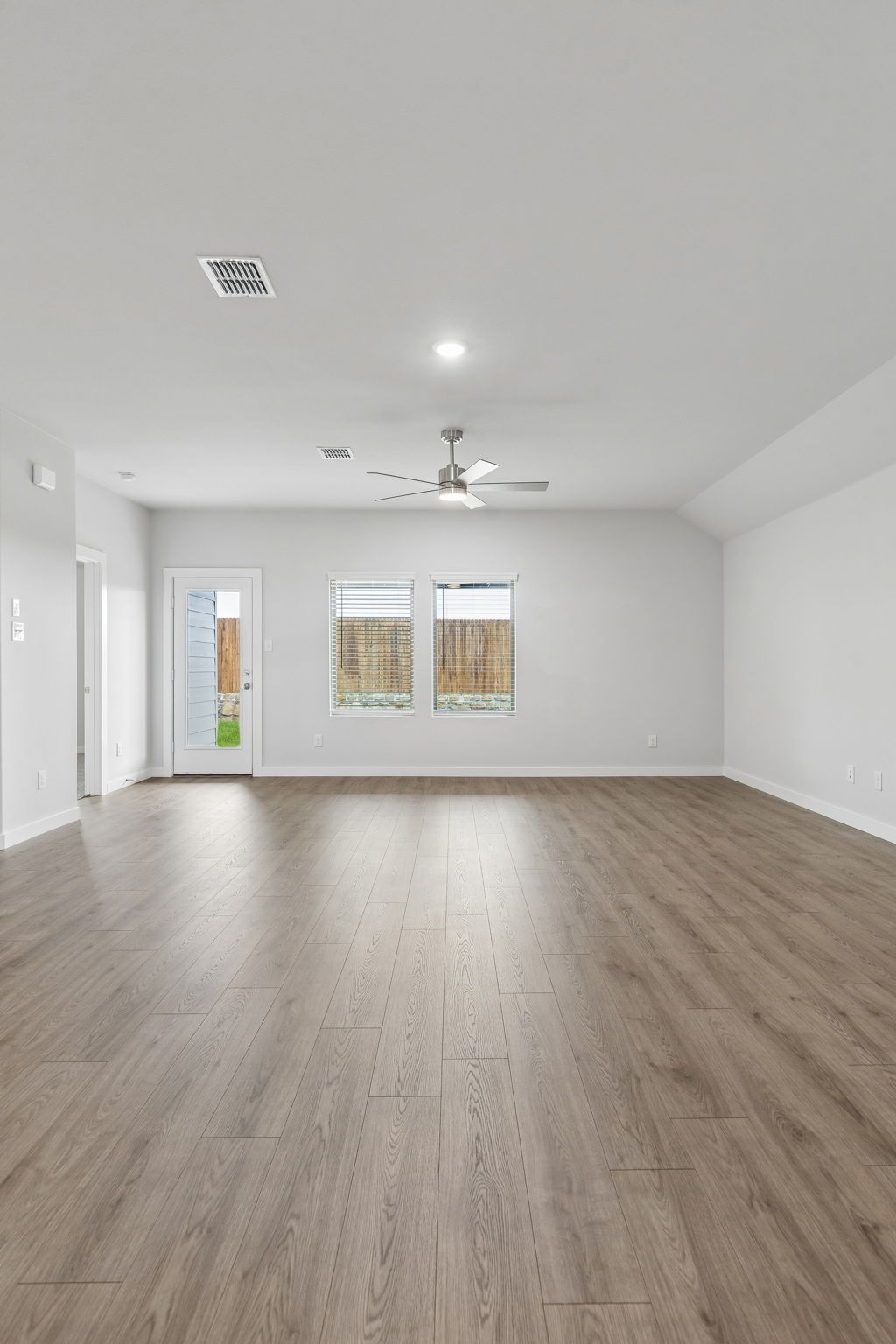 Living Room in the Oscar home plan by Trophy Signature Homes – REPRESENTATIVE PHOTO