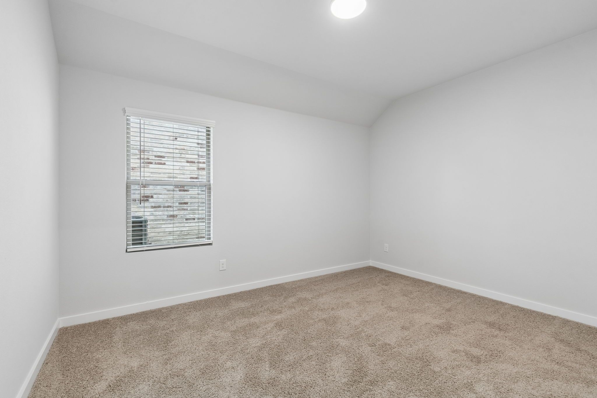 Bedroom in the Oscar home plan by Trophy Signature Homes – REPRESENTATIVE PHOTO