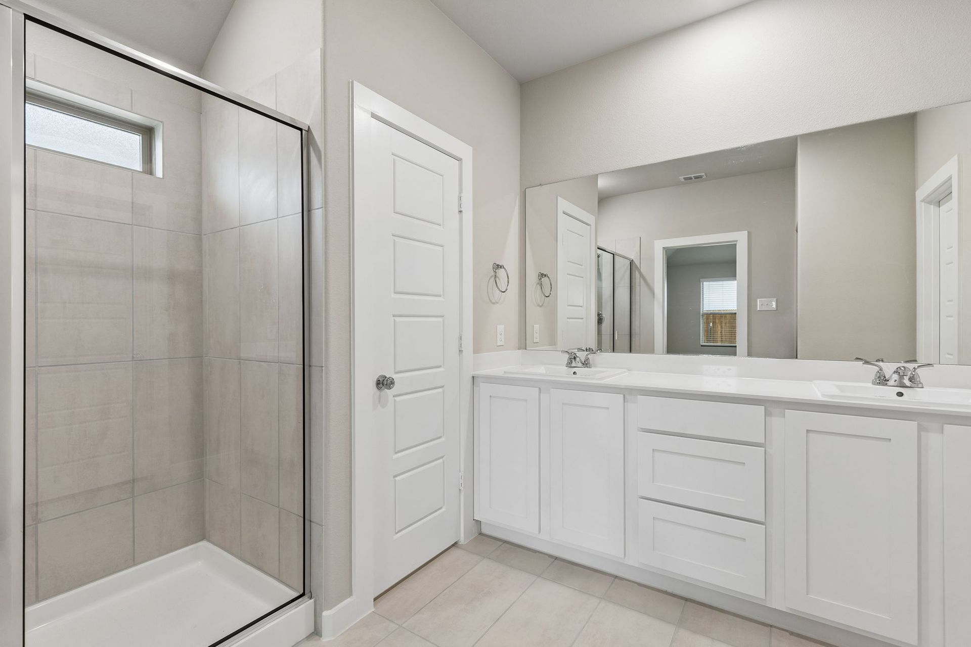 Primary Bathroom in the Emmy II home plan by Trophy Signature Homes - REPRESENTATIVE PHOTO