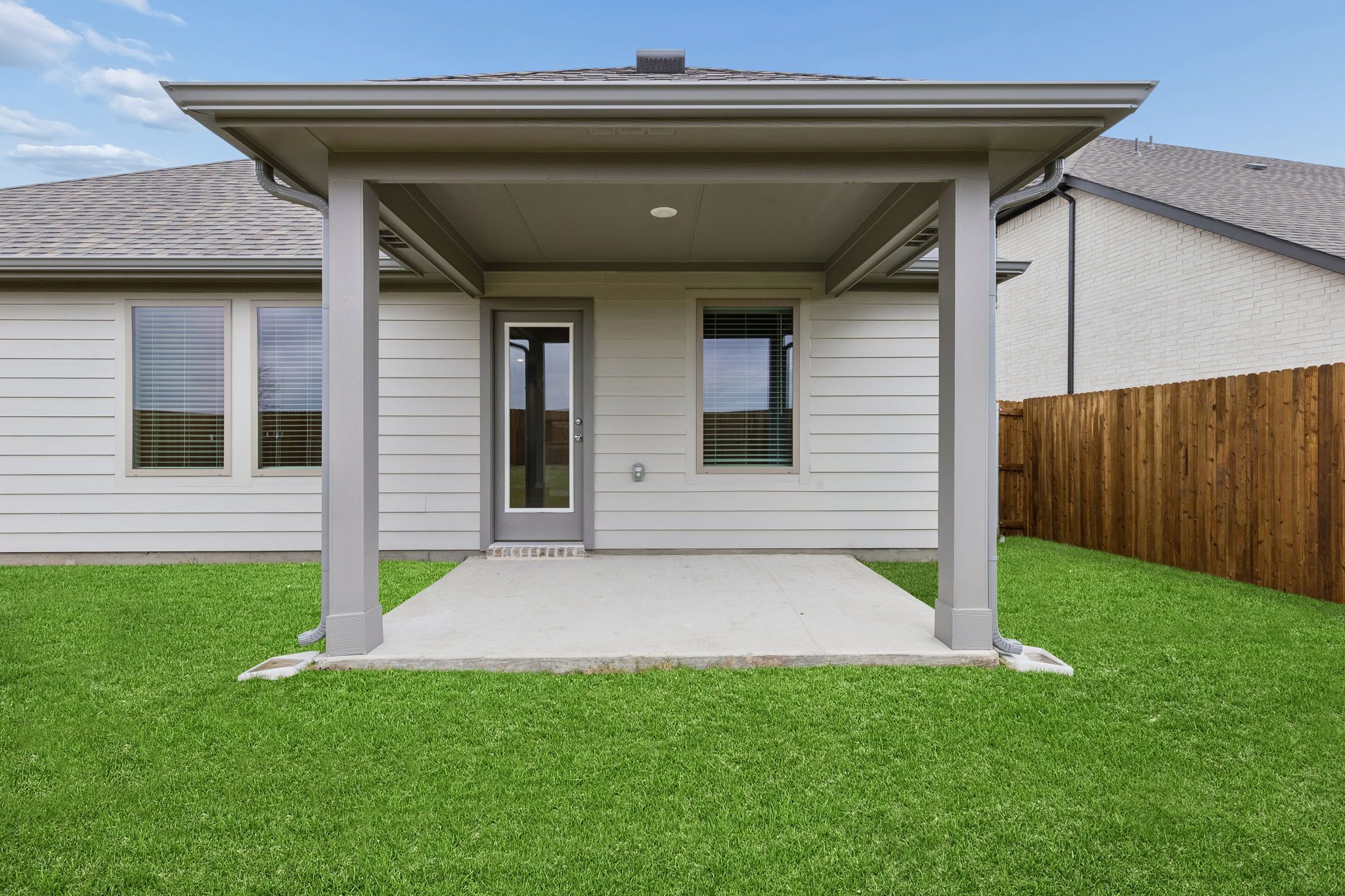 Covered Patio in the Emmy II home plan by Trophy Signature Homes - REPRESENTATIVE PHOTO