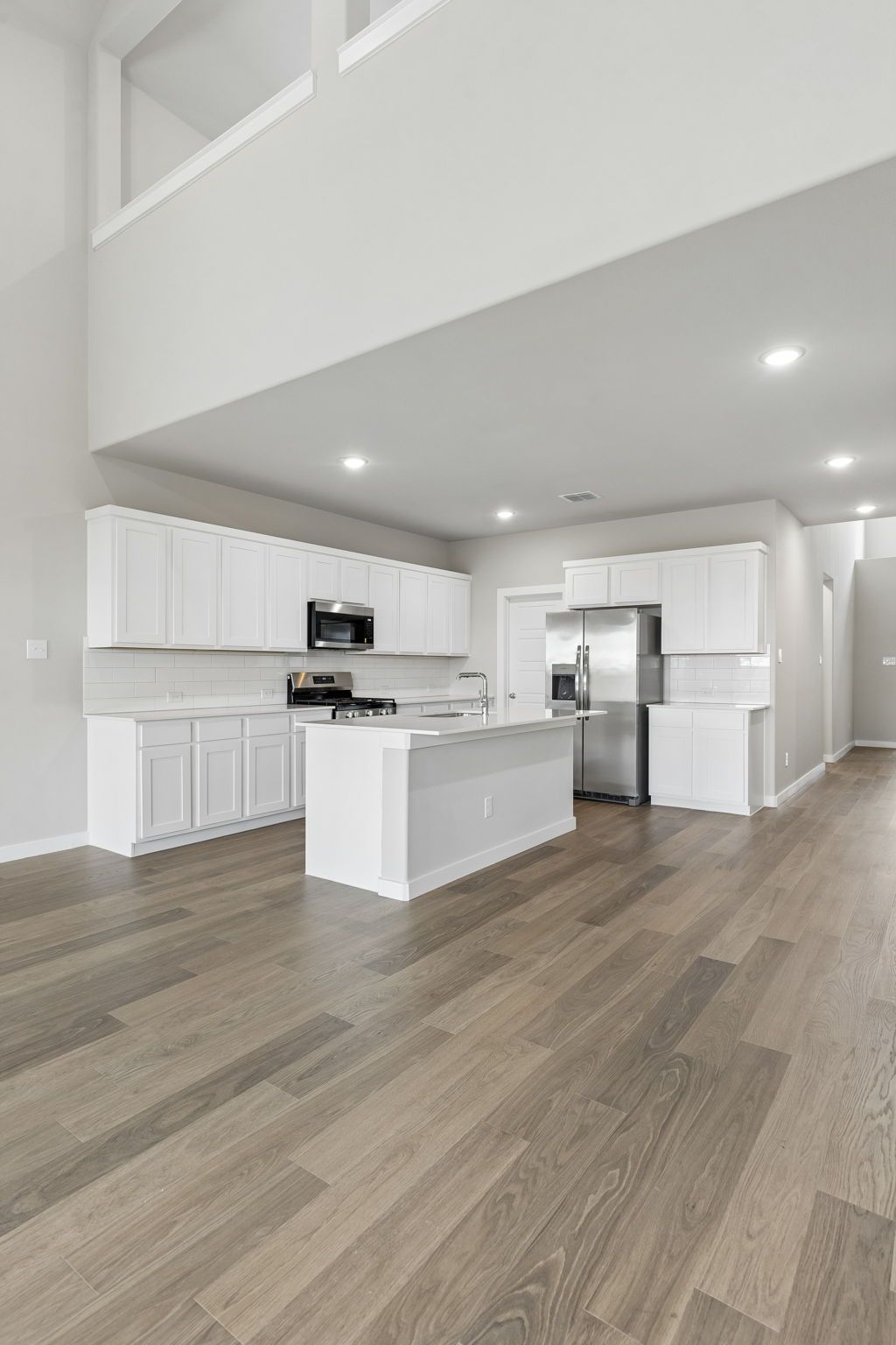 Kitchen in the Winters home plan by Trophy Signature Homes – REPRESENTATIVE PHOTO