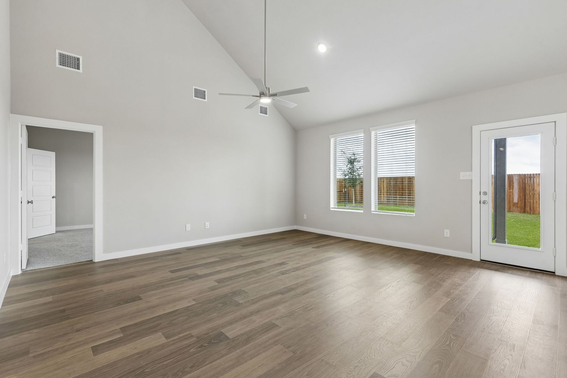 Living Room in the Winters home plan by Trophy Signature Homes – REPRESENTATIVE PHOTO