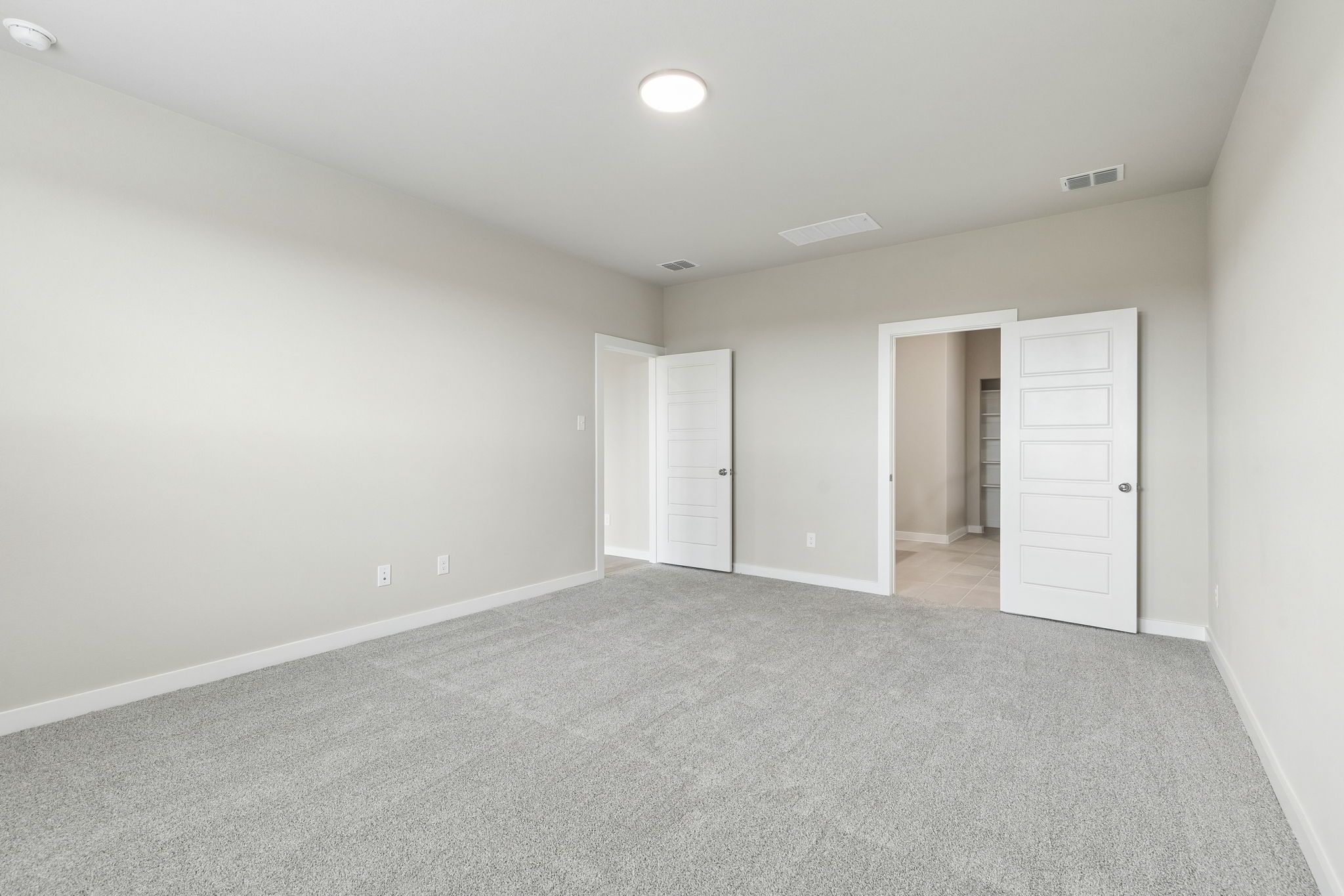 Primary Suite in the Winters home plan by Trophy Signature Homes – REPRESENTATIVE PHOTO