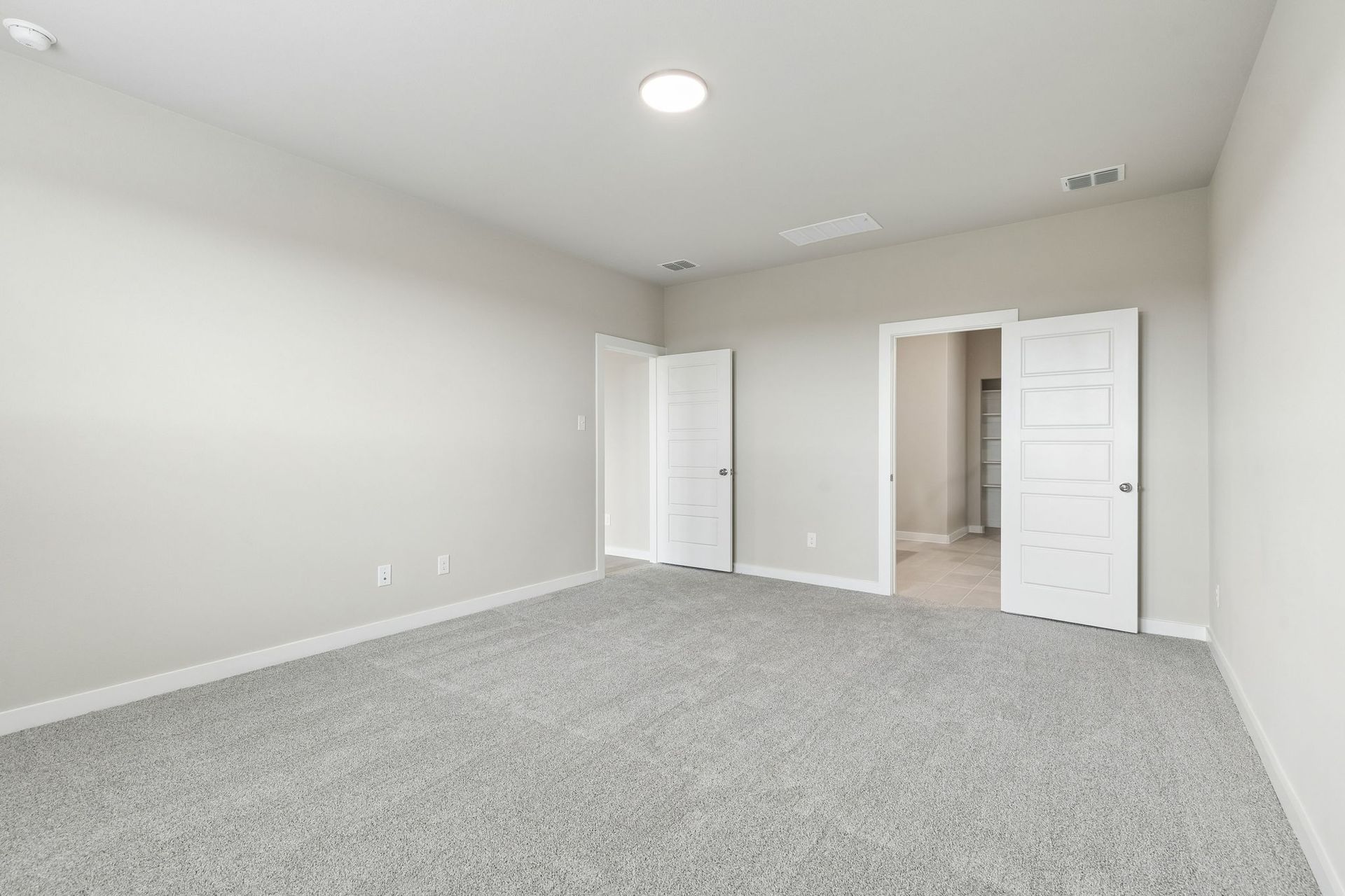Primary Suite in the Winters home plan by Trophy Signature Homes – REPRESENTATIVE PHOTO
