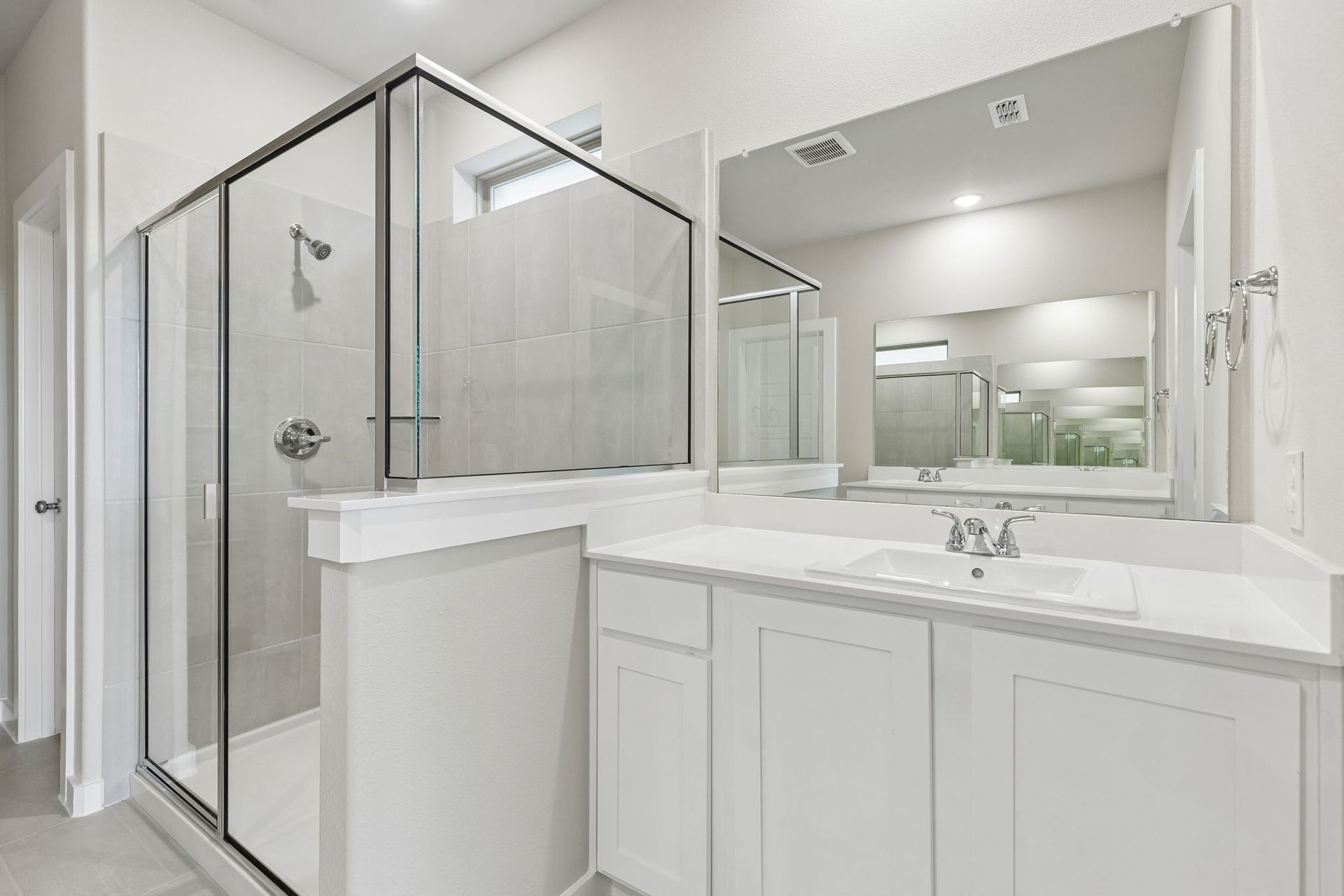 Primary Bathroom in the Winters home plan by Trophy Signature Homes – REPRESENTATIVE PHOTO