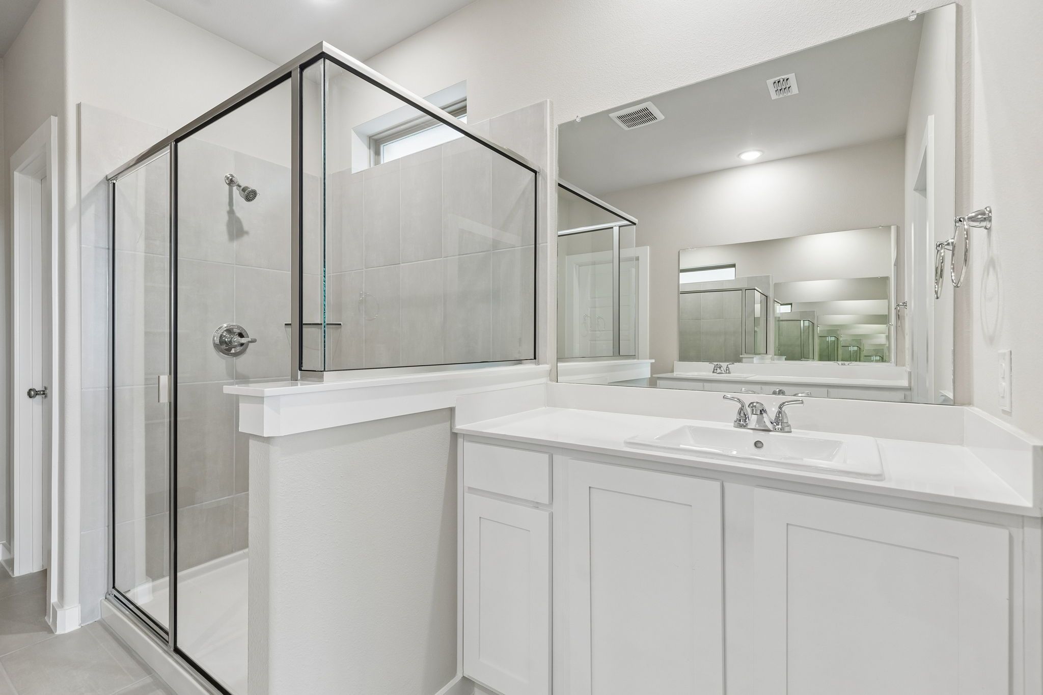 Primary Bathroom in the Winters home plan by Trophy Signature Homes – REPRESENTATIVE PHOTO