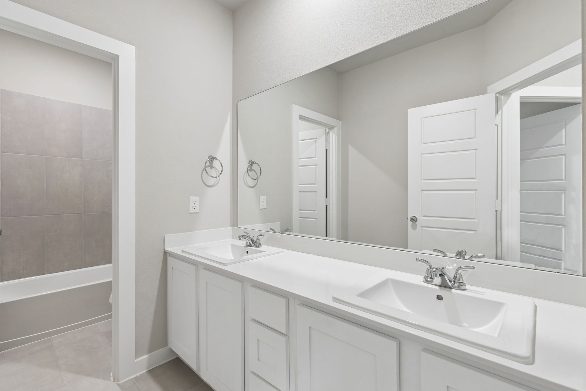 Bathroom in the Winters home plan by Trophy Signature Homes – REPRESENTATIVE PHOTO