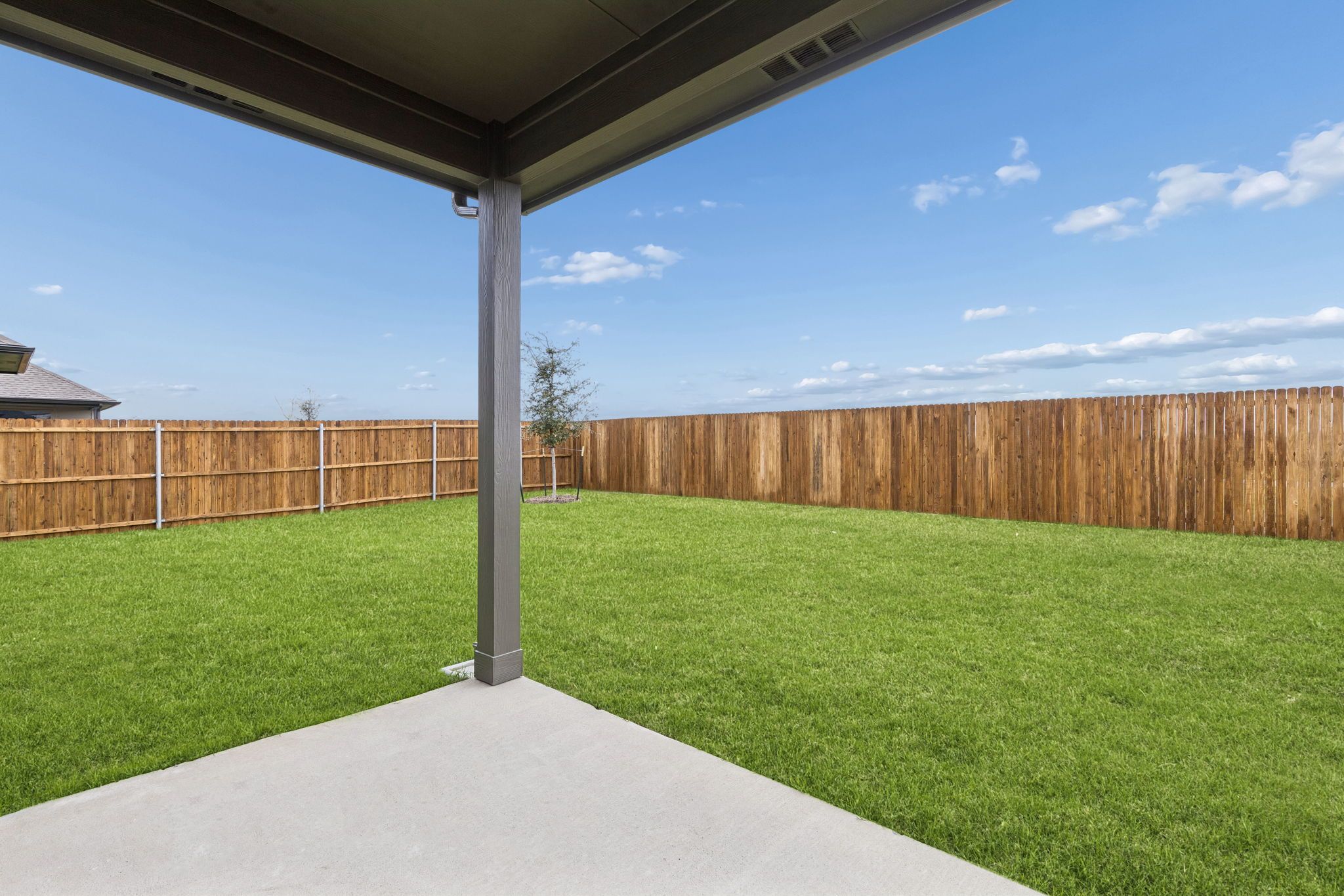 Covered Patio in the Winters home plan by Trophy Signature Homes – REPRESENTATIVE PHOTO