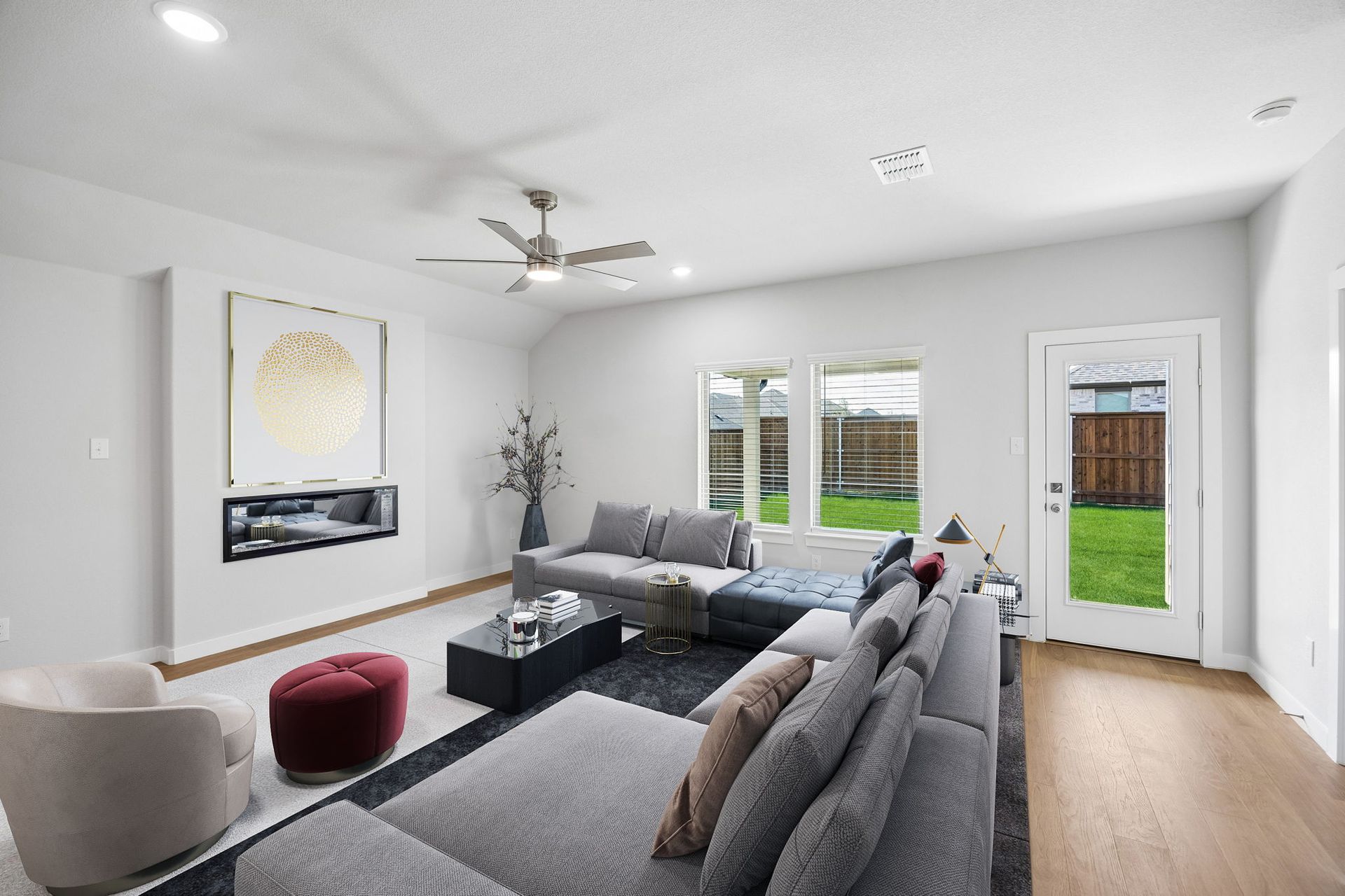 Living Room in the Oscar home plan by Trophy Signature Homes – REPRESENTATIVE PHOTO