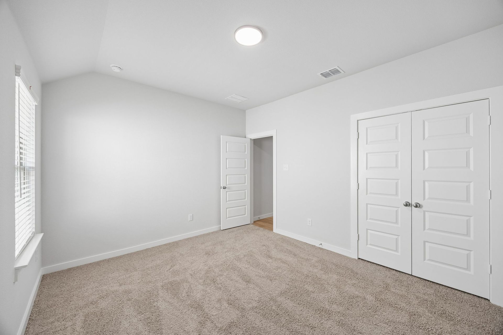 Primary Suite in the Oscar home plan by Trophy Signature Homes – REPRESENTATIVE PHOTO