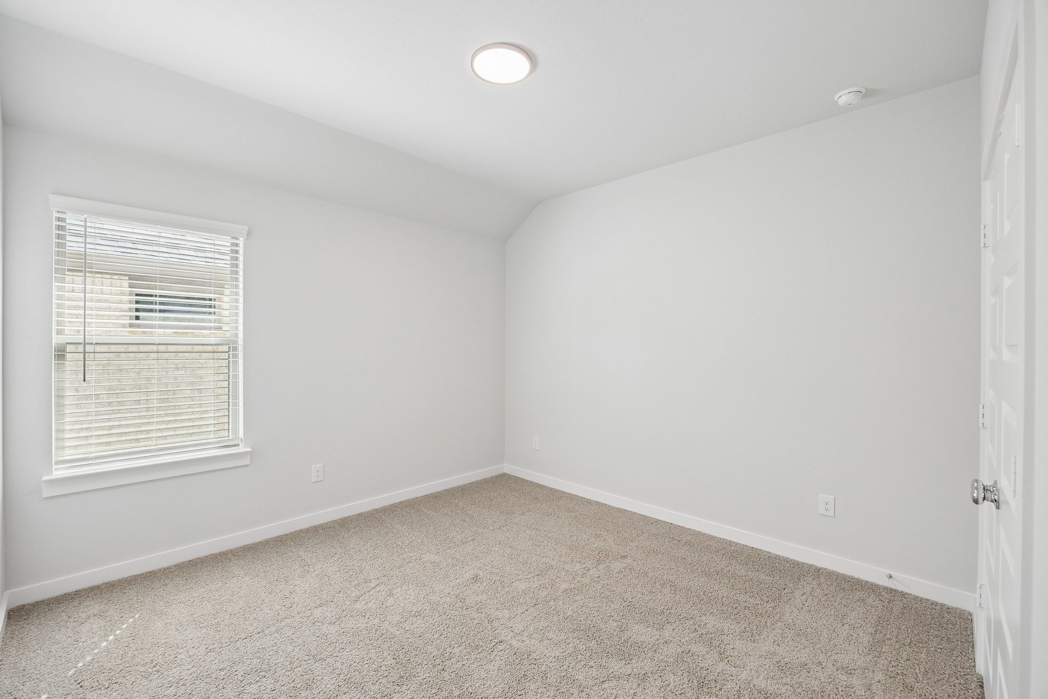 Bedroom in the Oscar home plan by Trophy Signature Homes – REPRESENTATIVE PHOTO