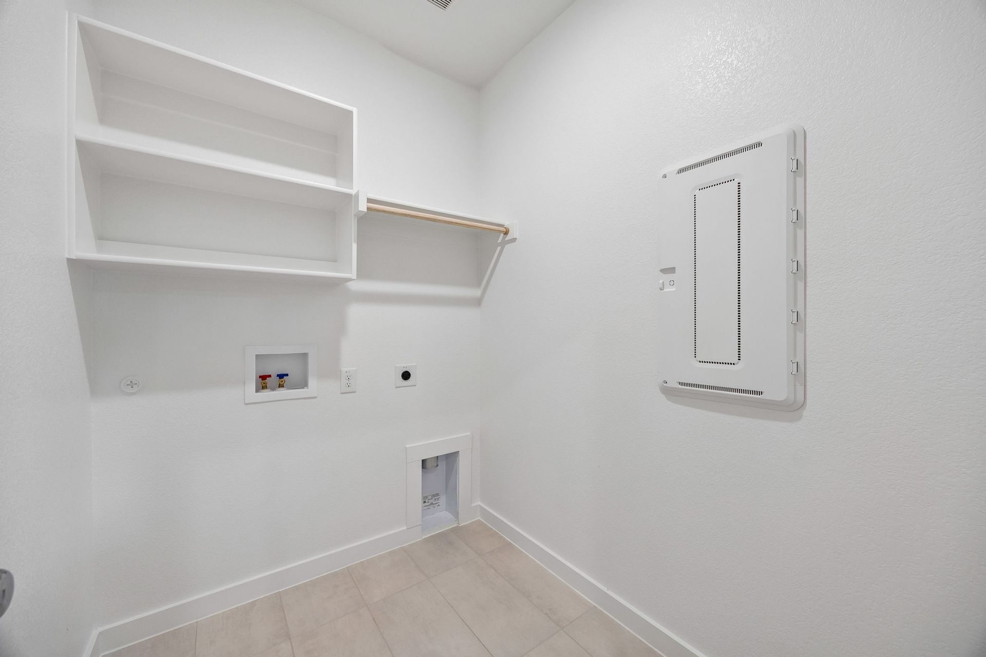 Utility Room in the Oscar home plan by Trophy Signature Homes – REPRESENTATIVE PHOTO