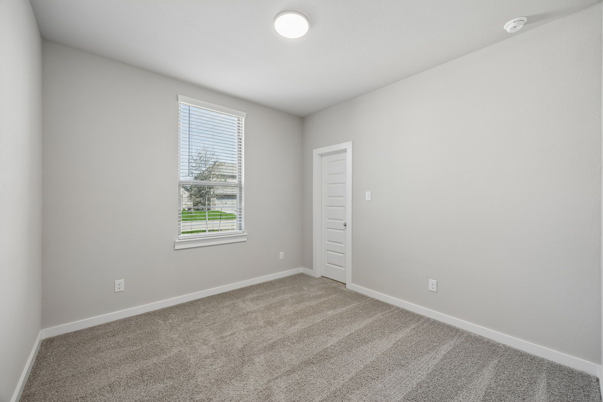 Bedroom in the Emmy II home plan by Trophy Signature Homes - REPRESENTATIVE PHOTO