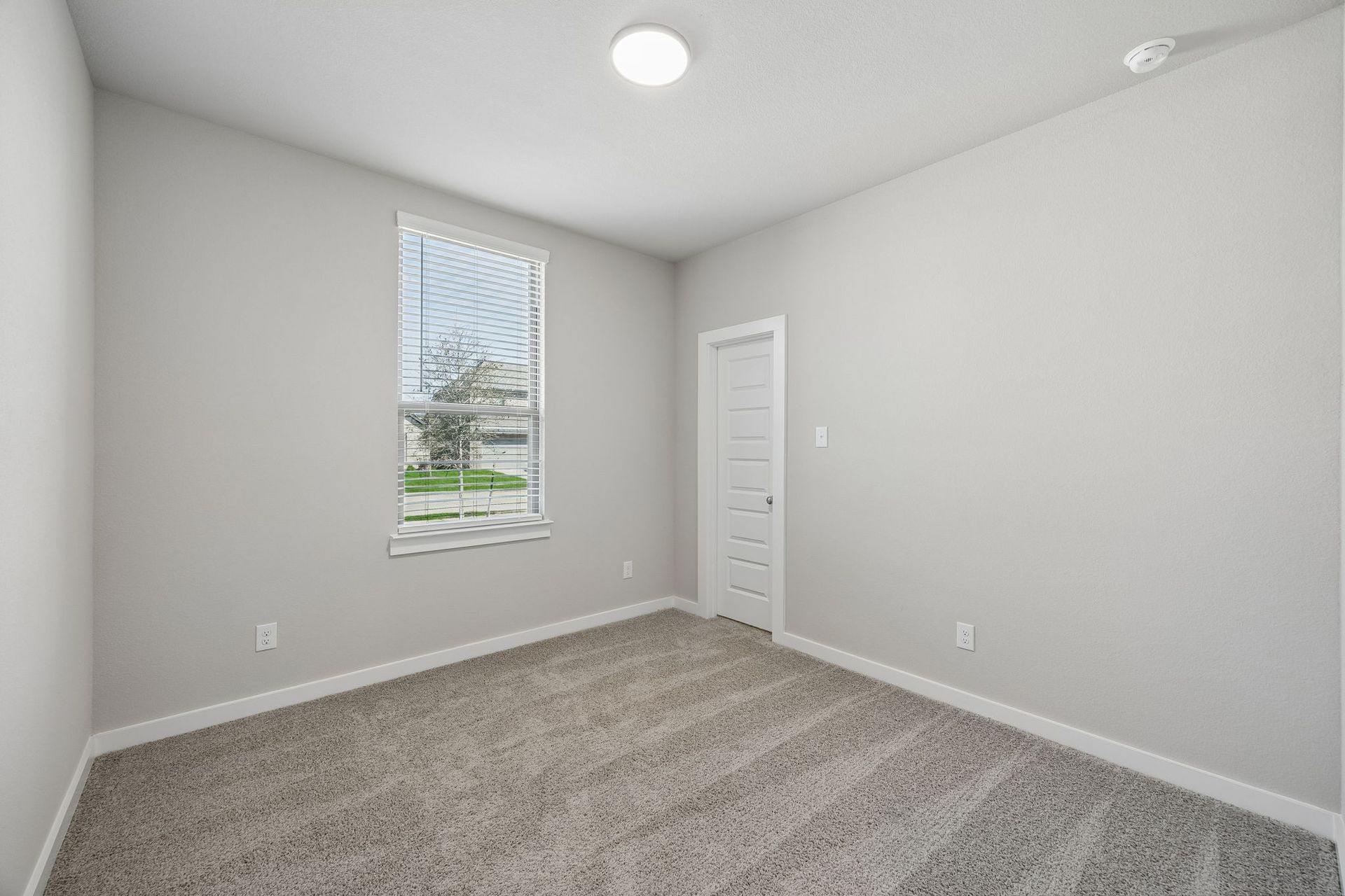 Bedroom in the Emmy II home plan by Trophy Signature Homes - REPRESENTATIVE PHOTO