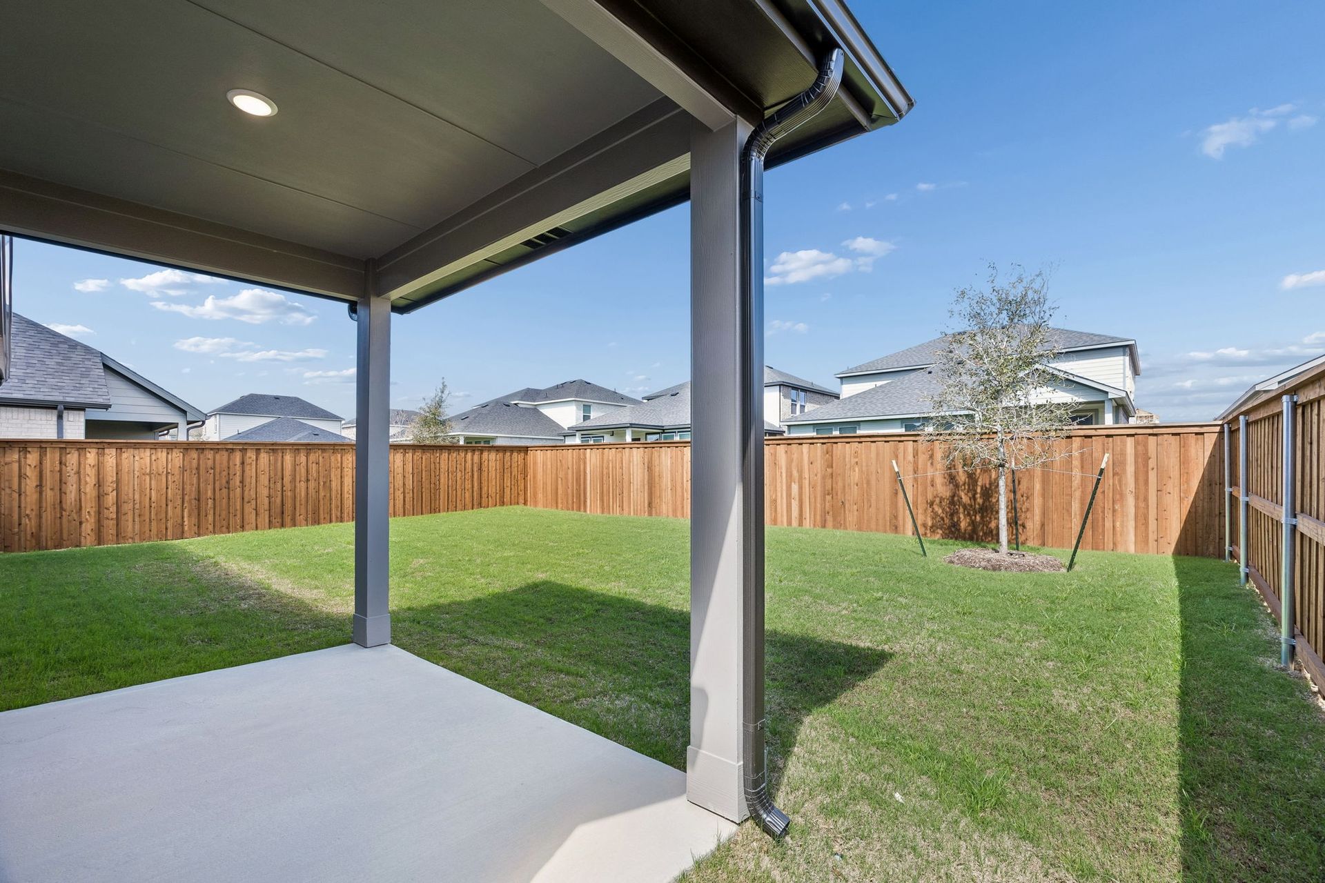 Covered Patio in the Winters home plan by Trophy Signature Homes – REPRESENTATIVE PHOTO