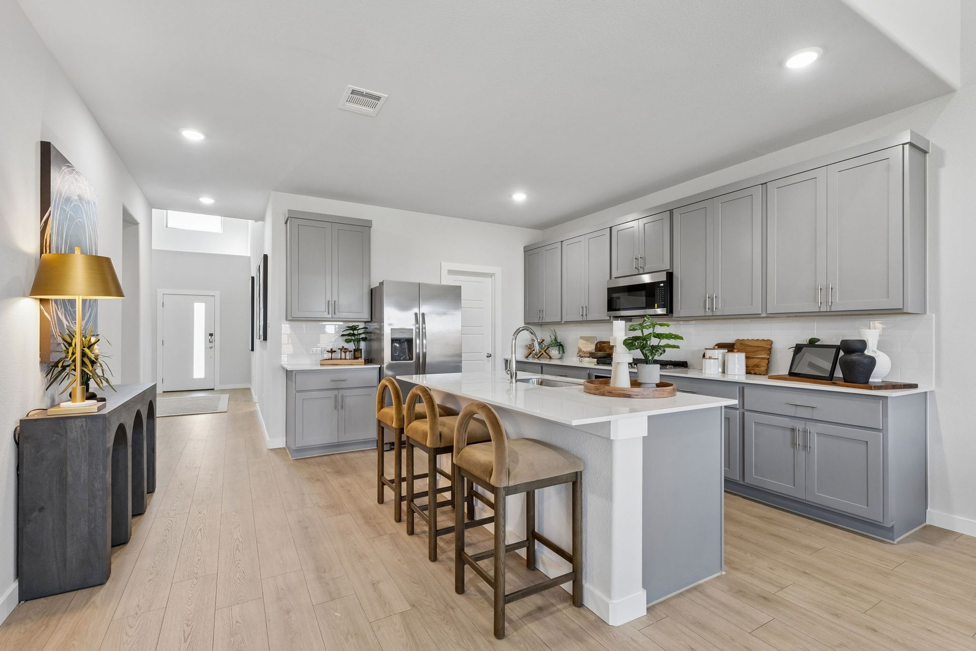 Kitchen in the Winters model home in Gunter TX by Trophy Signature Homes