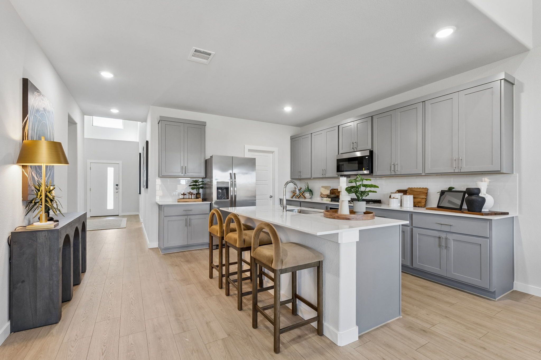 Kitchen in the Winters model home in Gunter TX by Trophy Signature Homes