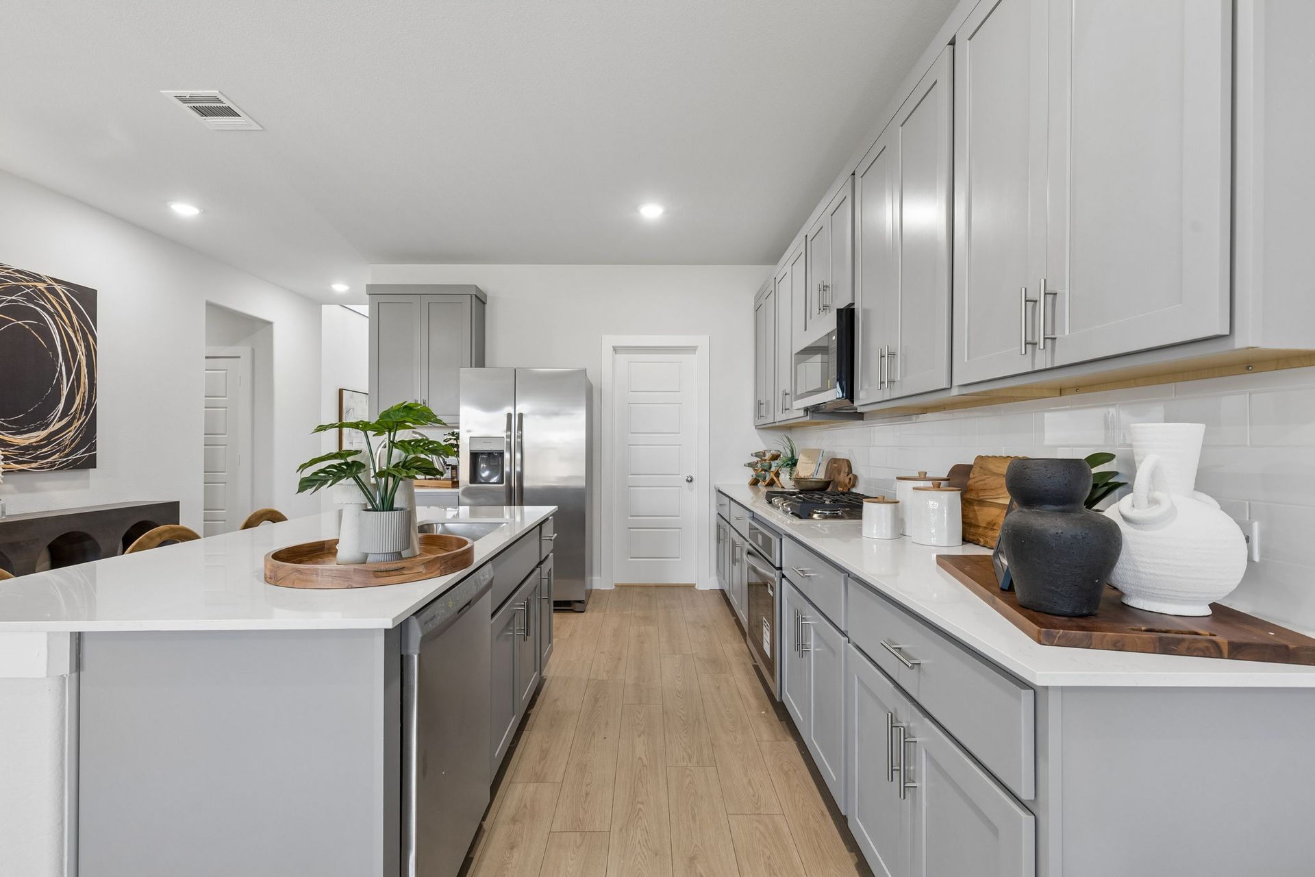 Kitchen in the Winters model home in Gunter TX by Trophy Signature Homes