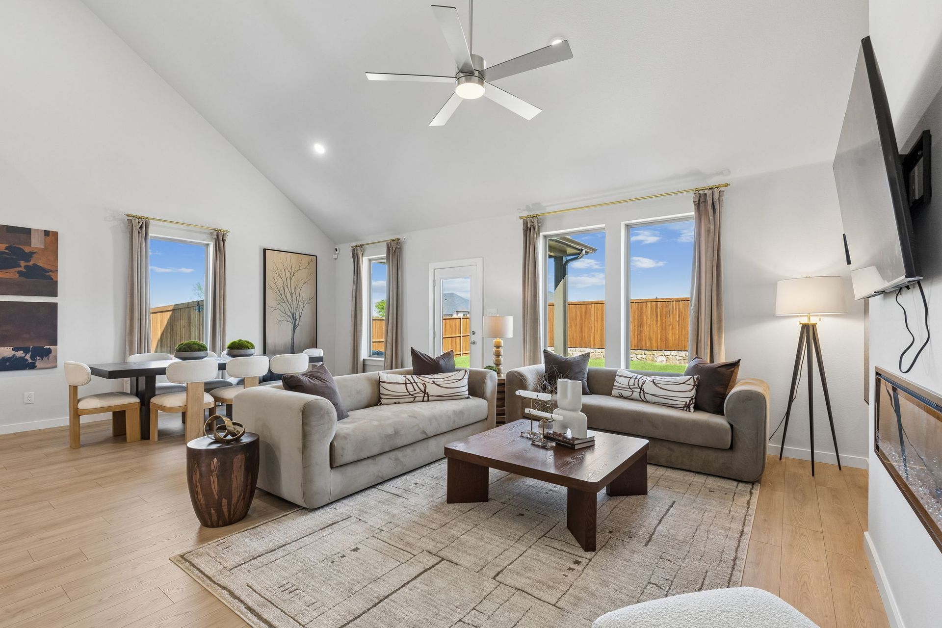 Living and Dining Rooms in the Winters model home in Gunter TX by Trophy Signature Homes