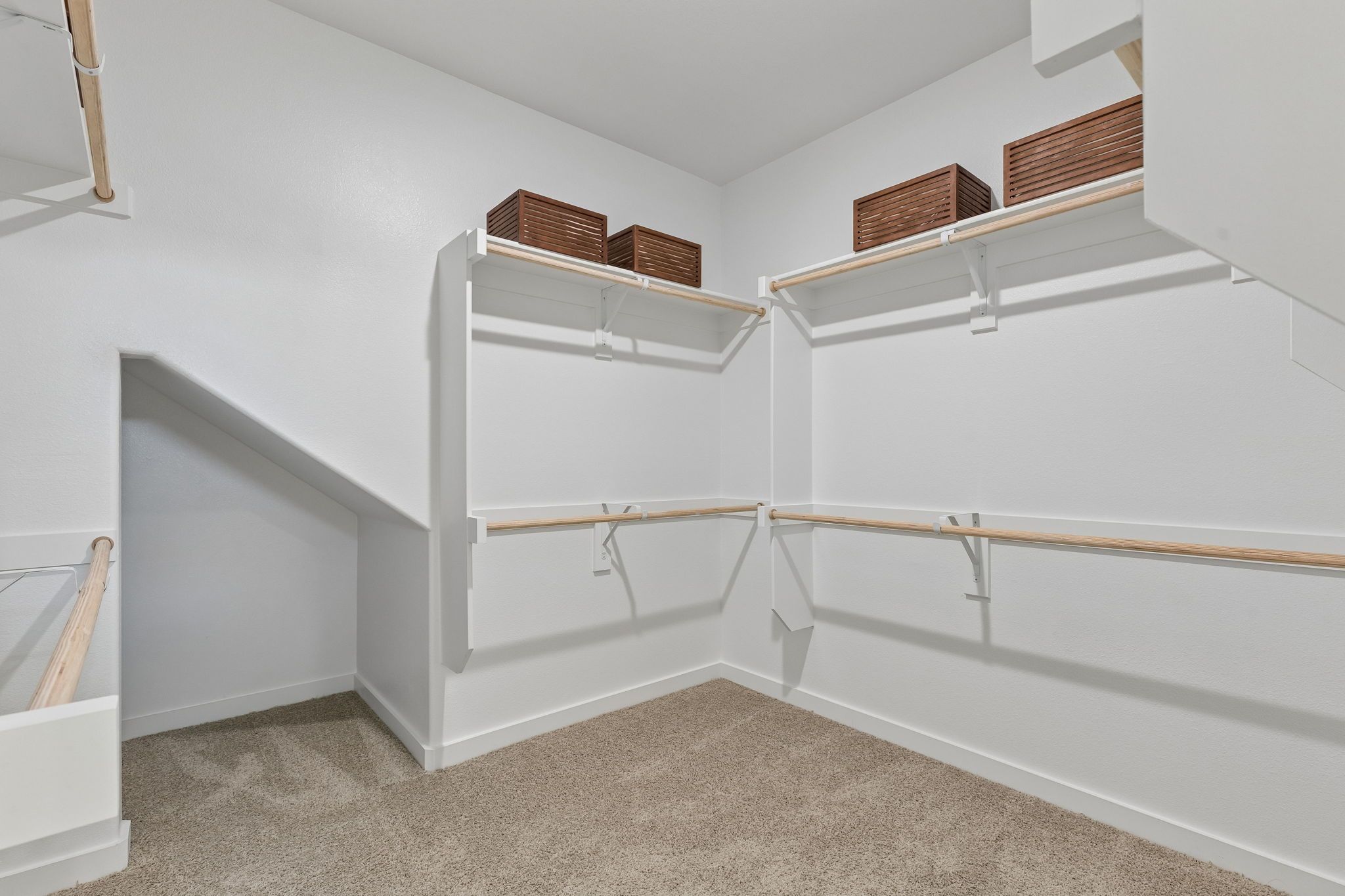 Primary Closet in the Winters model home in Gunter TX by Trophy Signature Homes