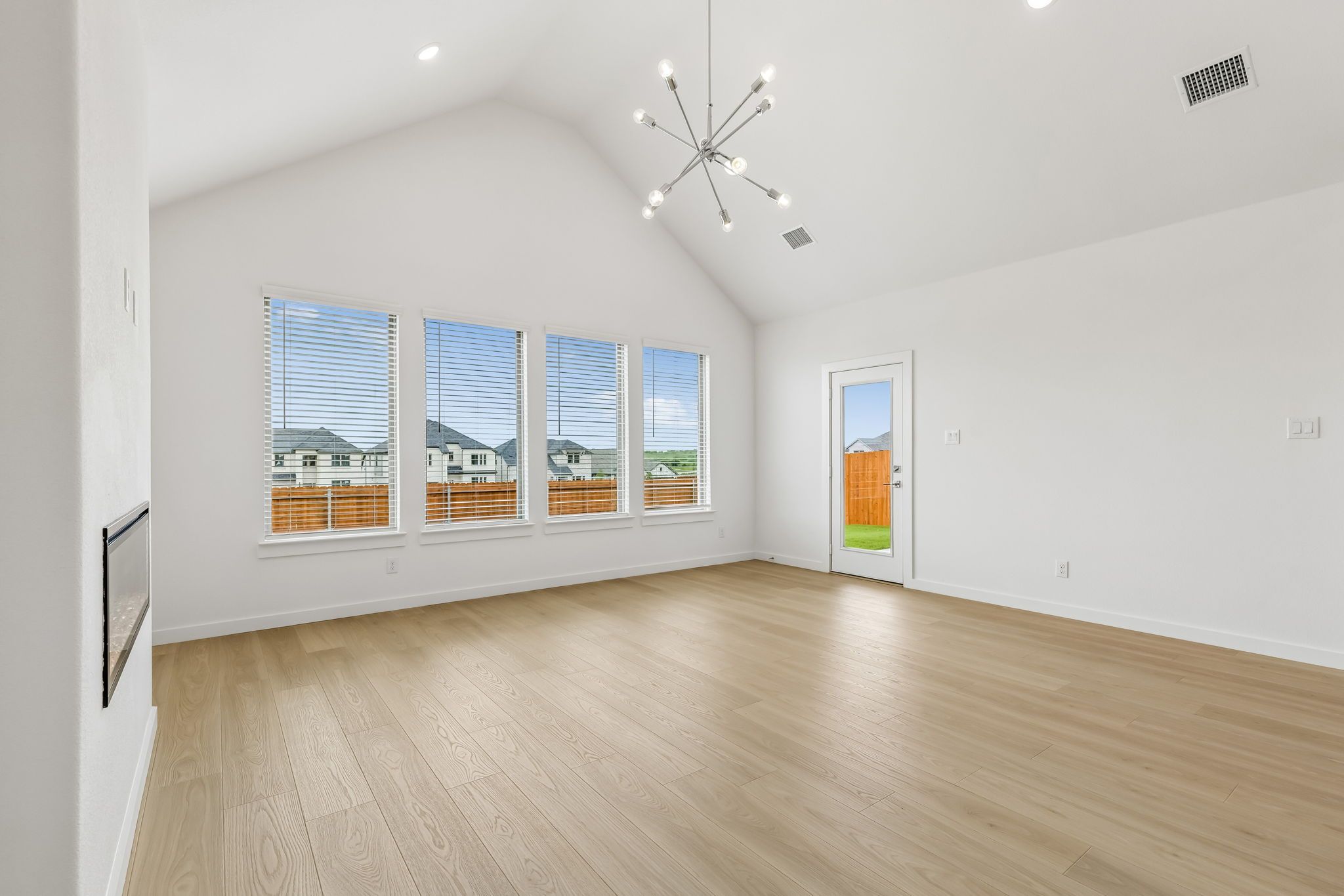 Living Room in the Claret home plan by Trophy Signature Homes – REPRESENTATIVE PHOTO