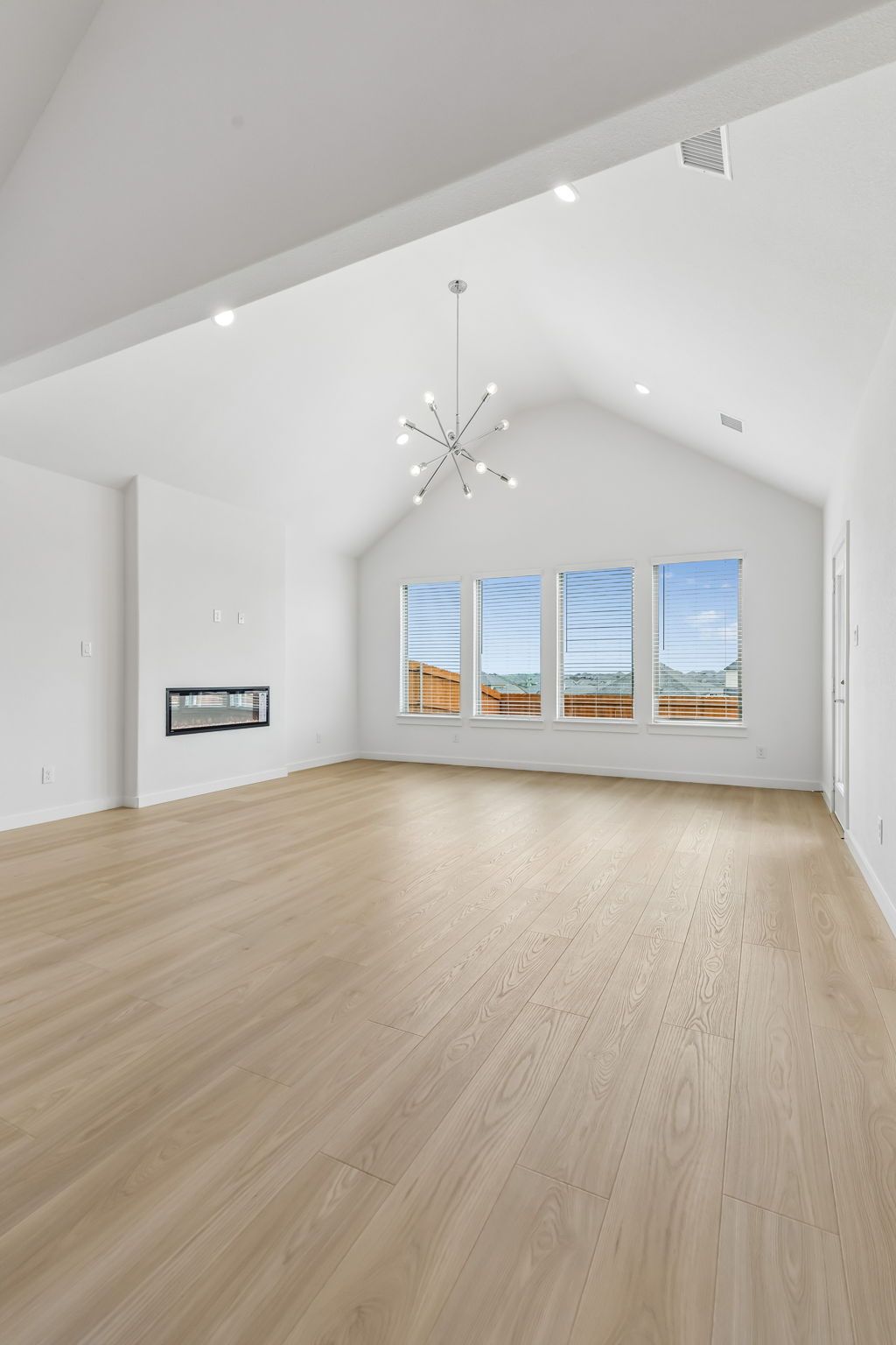 Living Room in the Claret home plan by Trophy Signature Homes – REPRESENTATIVE PHOTO