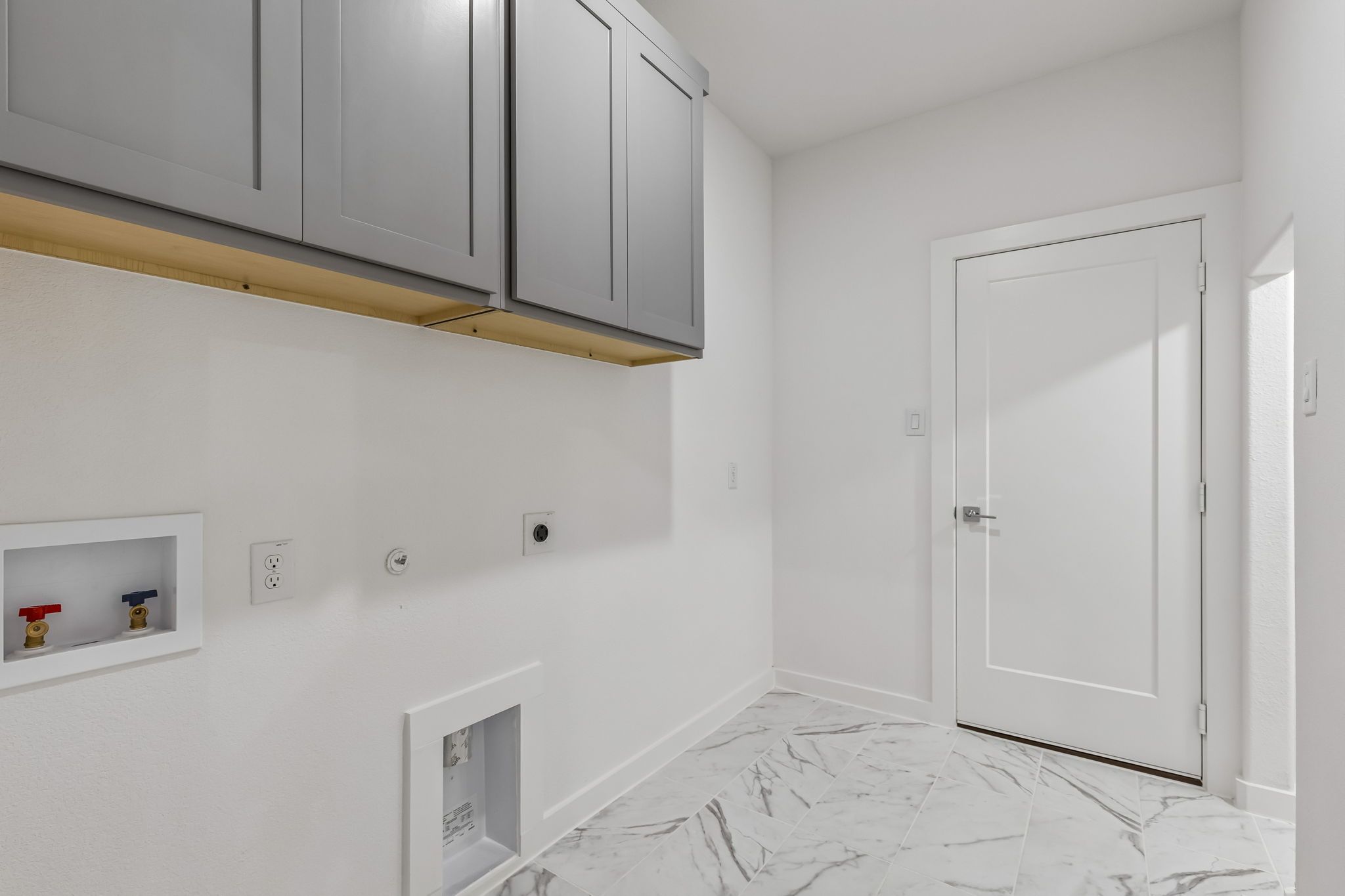 Utility Room in the Claret home plan by Trophy Signature Homes – REPRESENTATIVE PHOTO