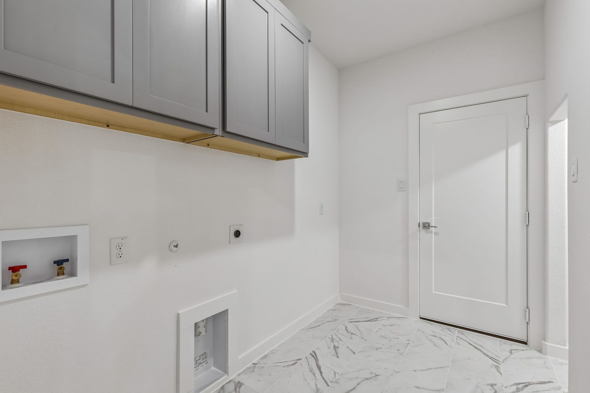 Utility Room in the Claret home plan by Trophy Signature Homes – REPRESENTATIVE PHOTO