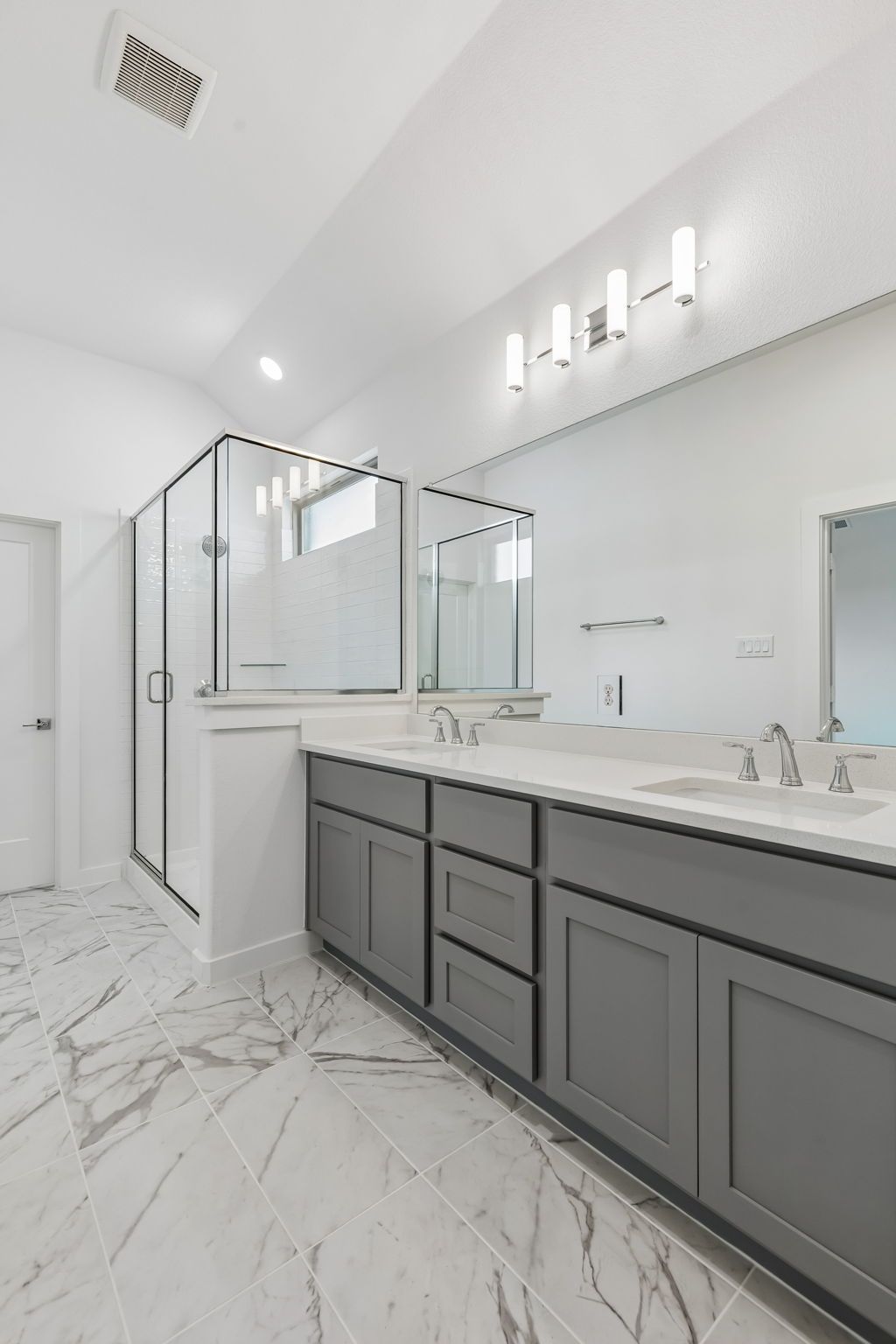 Primary Bathroom in the Claret home plan by Trophy Signature Homes – REPRESENTATIVE PHOTO