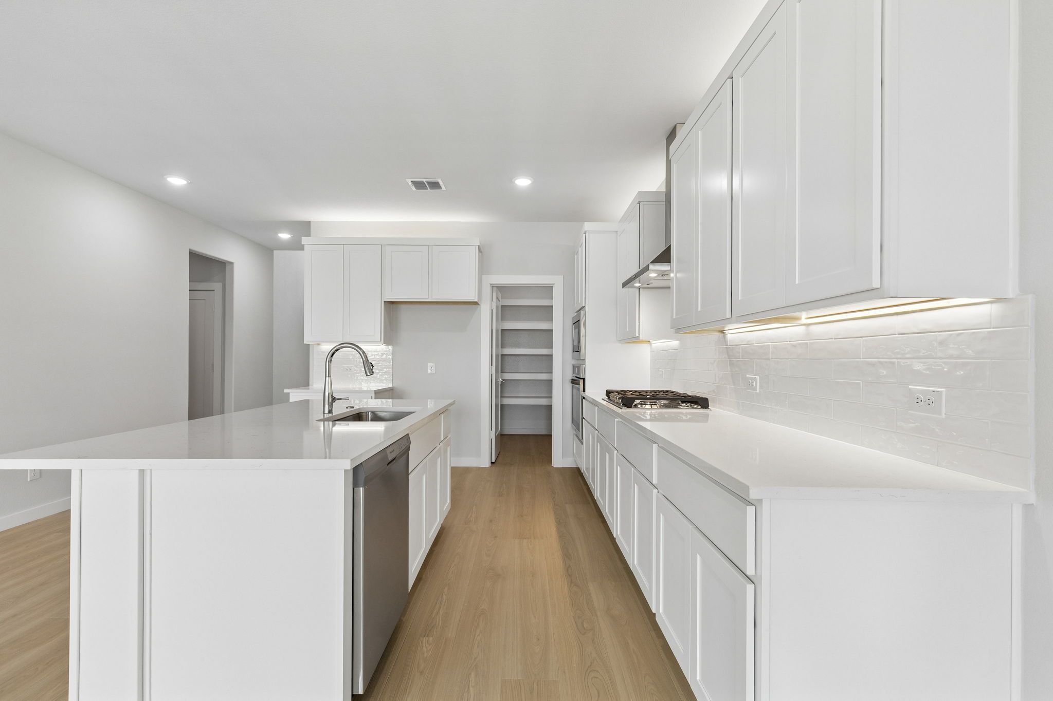 Kitchen in the Winters home plan by Trophy Signature Homes – REPRESENTATIVE PHOTO