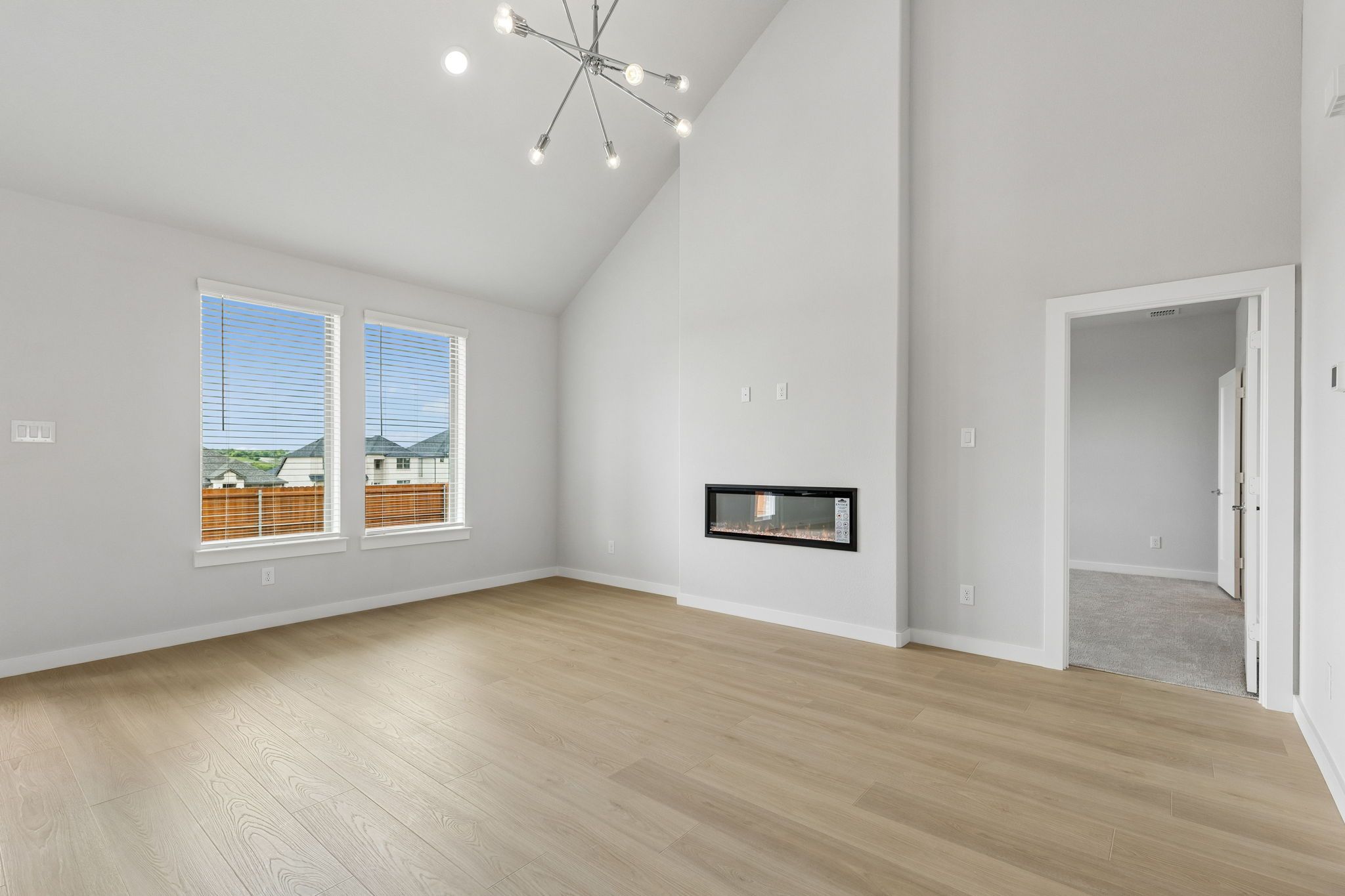 Living Room in the Winters home plan by Trophy Signature Homes – REPRESENTATIVE PHOTO