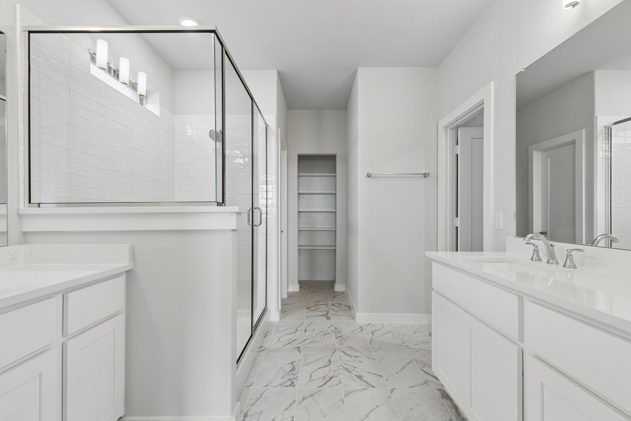 Primary Bathroom in the Winters home plan by Trophy Signature Homes – REPRESENTATIVE PHOTO