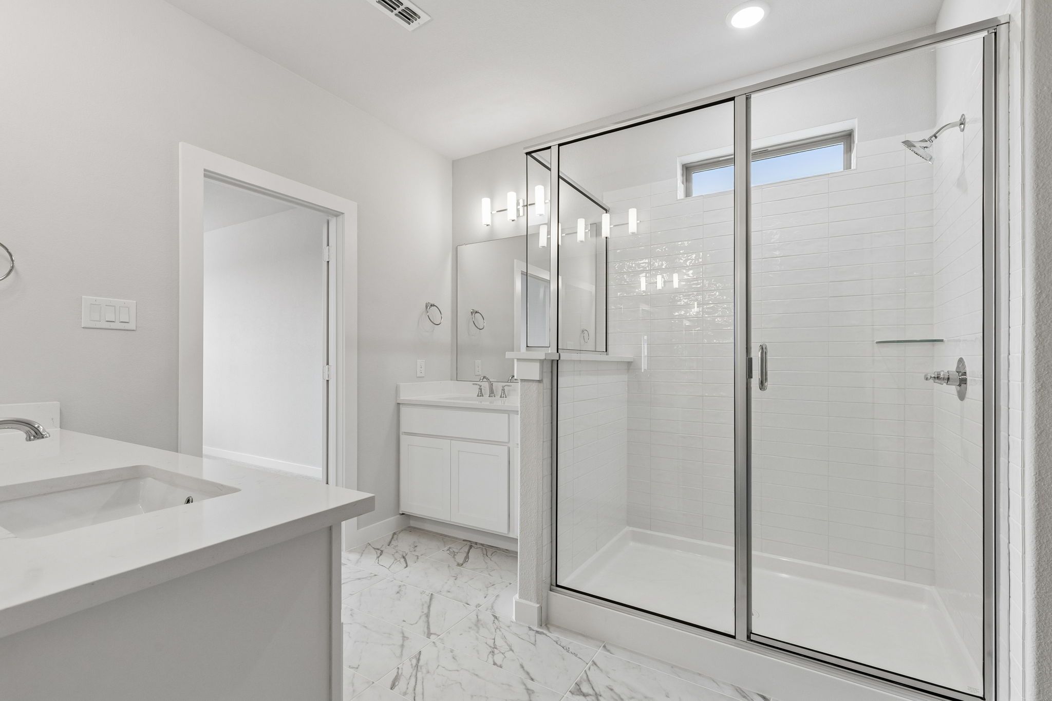 Primary Bathroom in the Winters home plan by Trophy Signature Homes – REPRESENTATIVE PHOTO