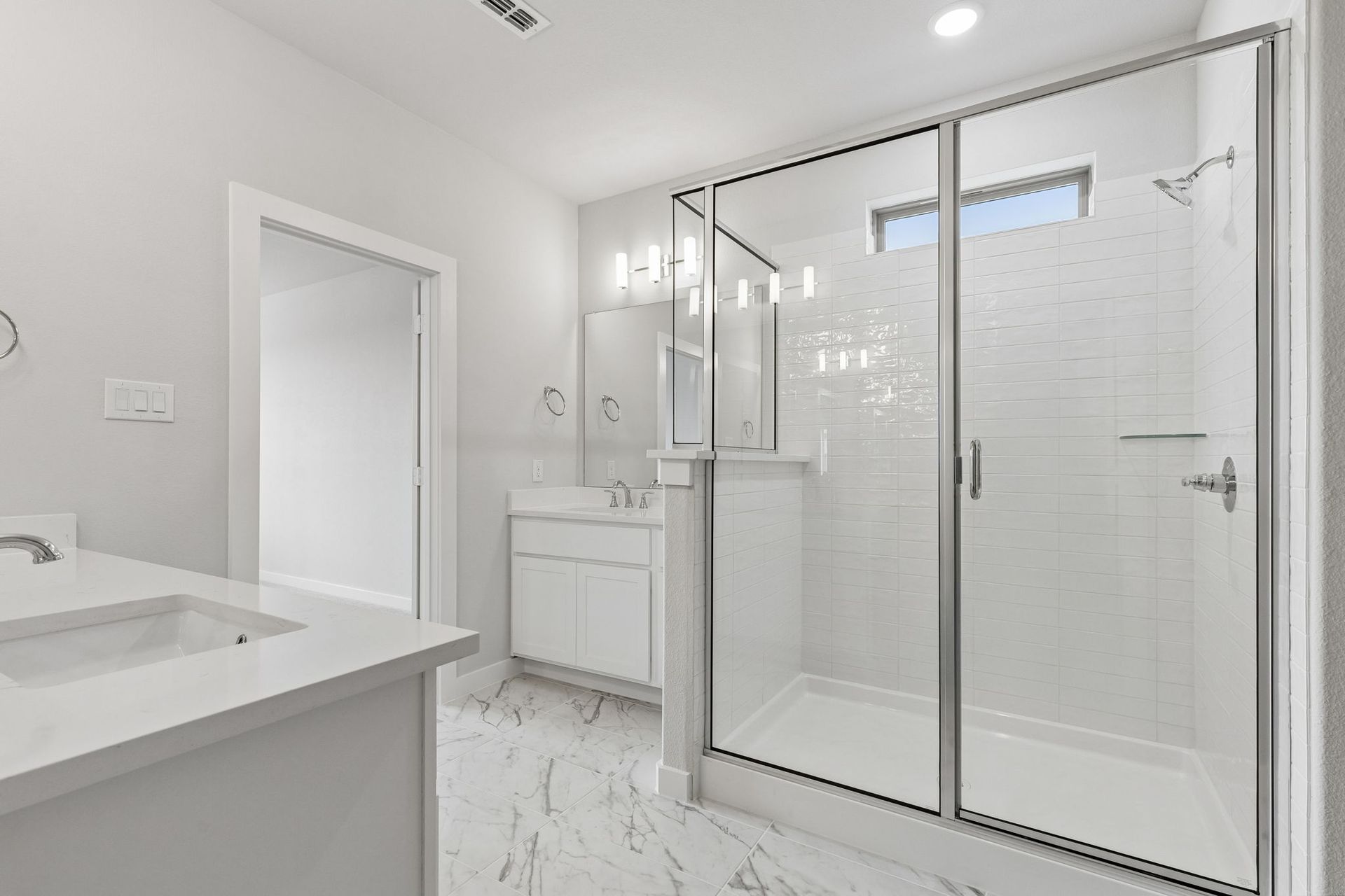 Primary Bathroom in the Winters home plan by Trophy Signature Homes – REPRESENTATIVE PHOTO