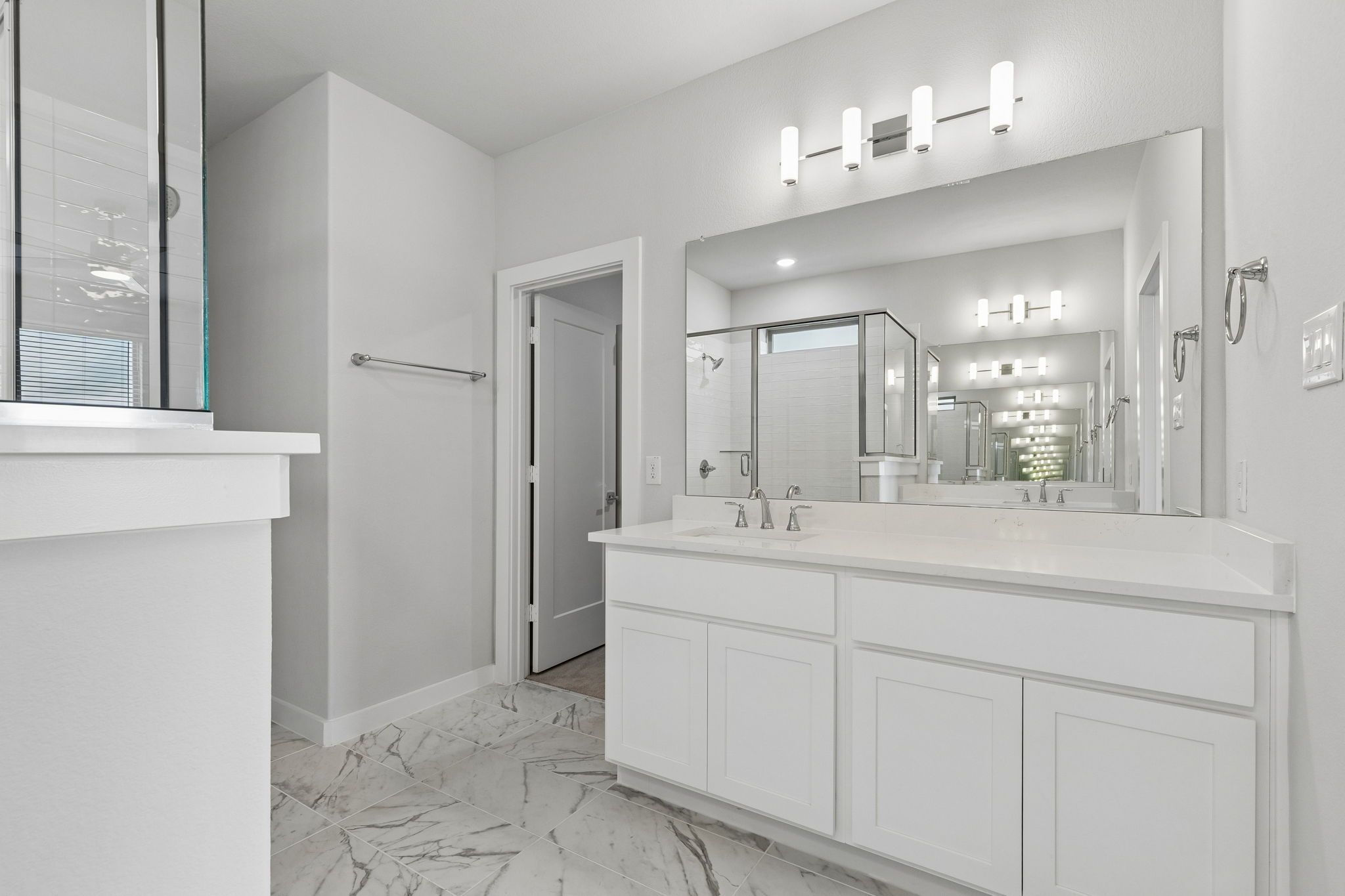 Primary Bathroom in the Winters home plan by Trophy Signature Homes – REPRESENTATIVE PHOTO