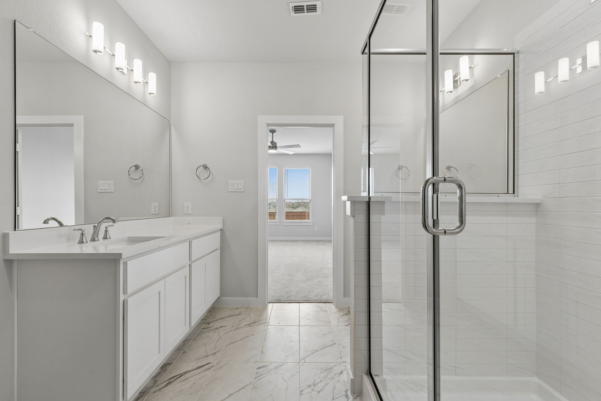 Primary Bathroom in the Winters home plan by Trophy Signature Homes – REPRESENTATIVE PHOTO