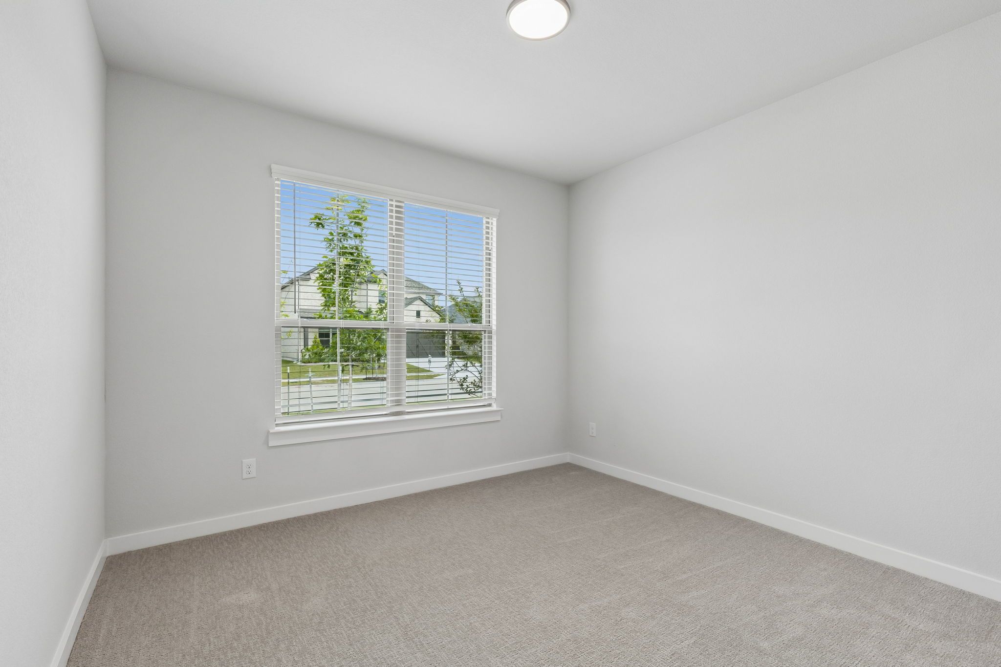 Bedroom in the Winters home plan by Trophy Signature Homes – REPRESENTATIVE PHOTO