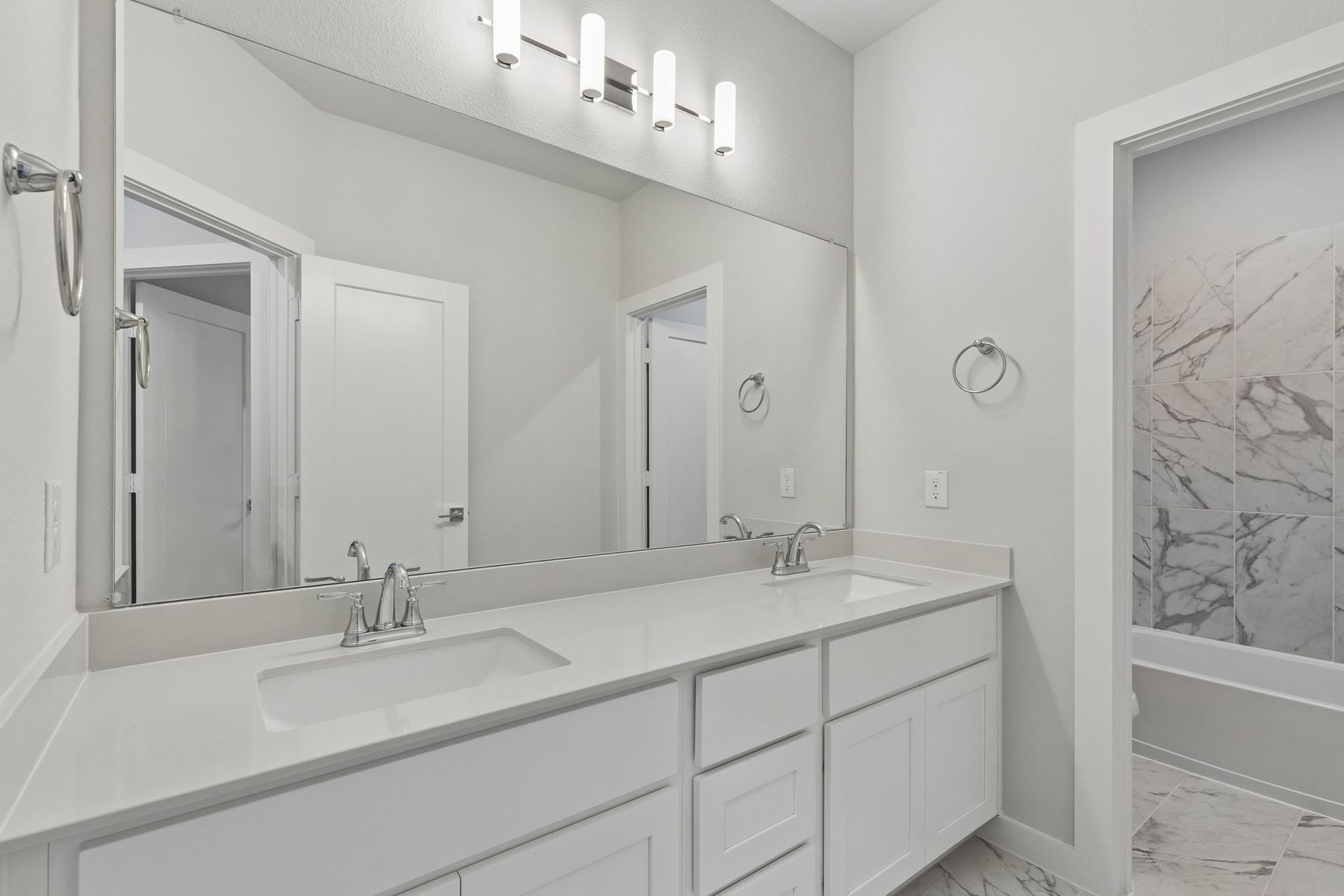 Bathroom in the Winters home plan by Trophy Signature Homes – REPRESENTATIVE PHOTO